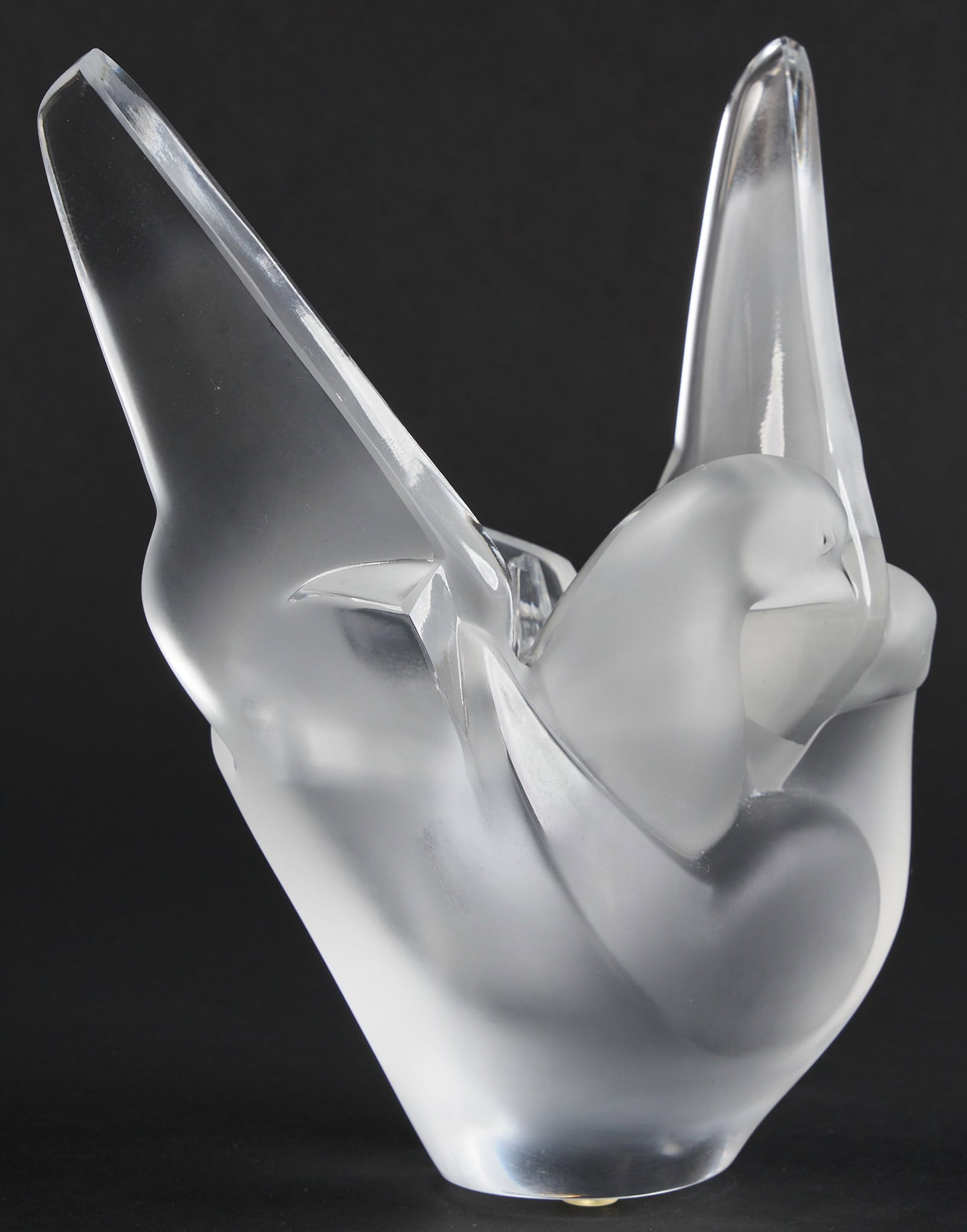 Lalique Sylvie Vase: Lalique "Sylvie" crystal sculpture depicting intertwised doves height 8.25 in. x width 7 in. x depth 4 in. Provenance: Property from a home in San Antonio, Texas