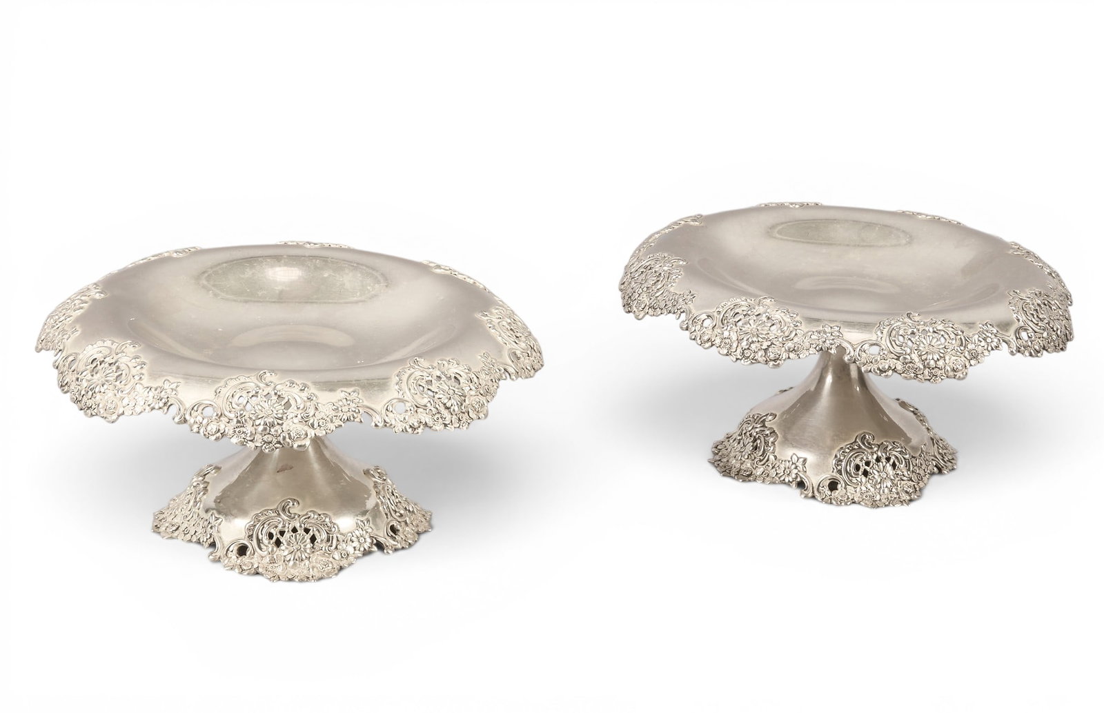 Pair of Tiffany & Co. Repousse Sterling Silver Compotes: Pair of Tiffany & Co. repousse sterling silver compotes, both marked "Tiffany & Co. Sterling Silver" height 3.5 in. x diameter 8 in. Total weight: 29.03 ozt weighable
