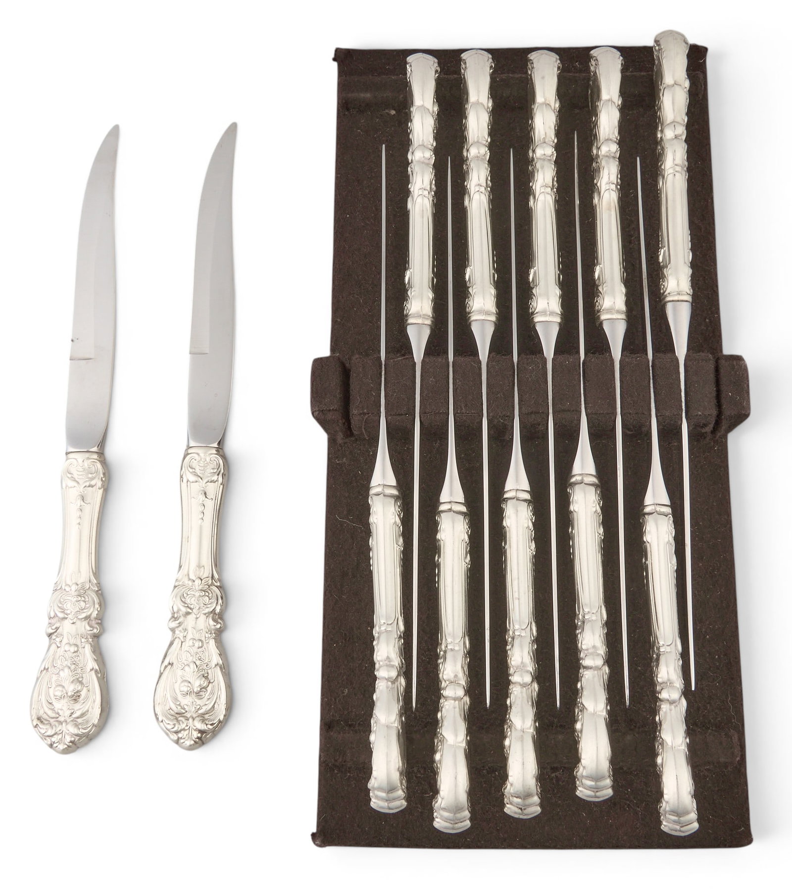 (12) "Francis I" by Reed and Barton Steak Knives: Twelve "Francis I" by Reed and Barton sterling silver handle steak knives length: 9 in. / each Provenance: Property from t