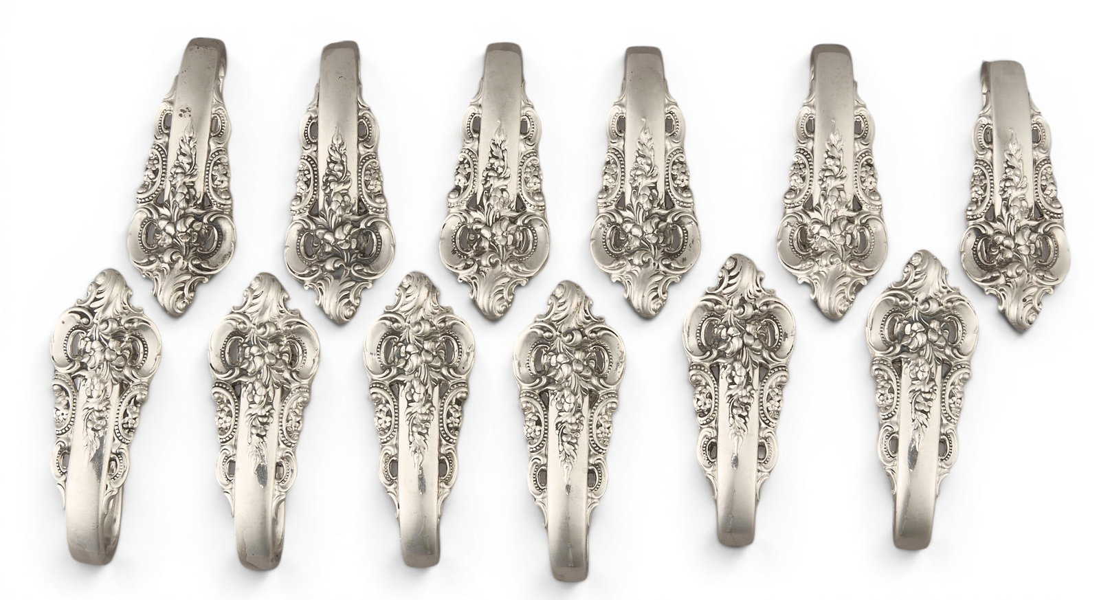 (12) "Grand Baroque" by Wallace Sterling Silver Napkin Holders: Twelve "Grand Baroque" by Wallace sterling silver napkin holders height 2 in. x width 1 in. x depth 1 in. / each Total weight: 8.57 ozt weighable silver 