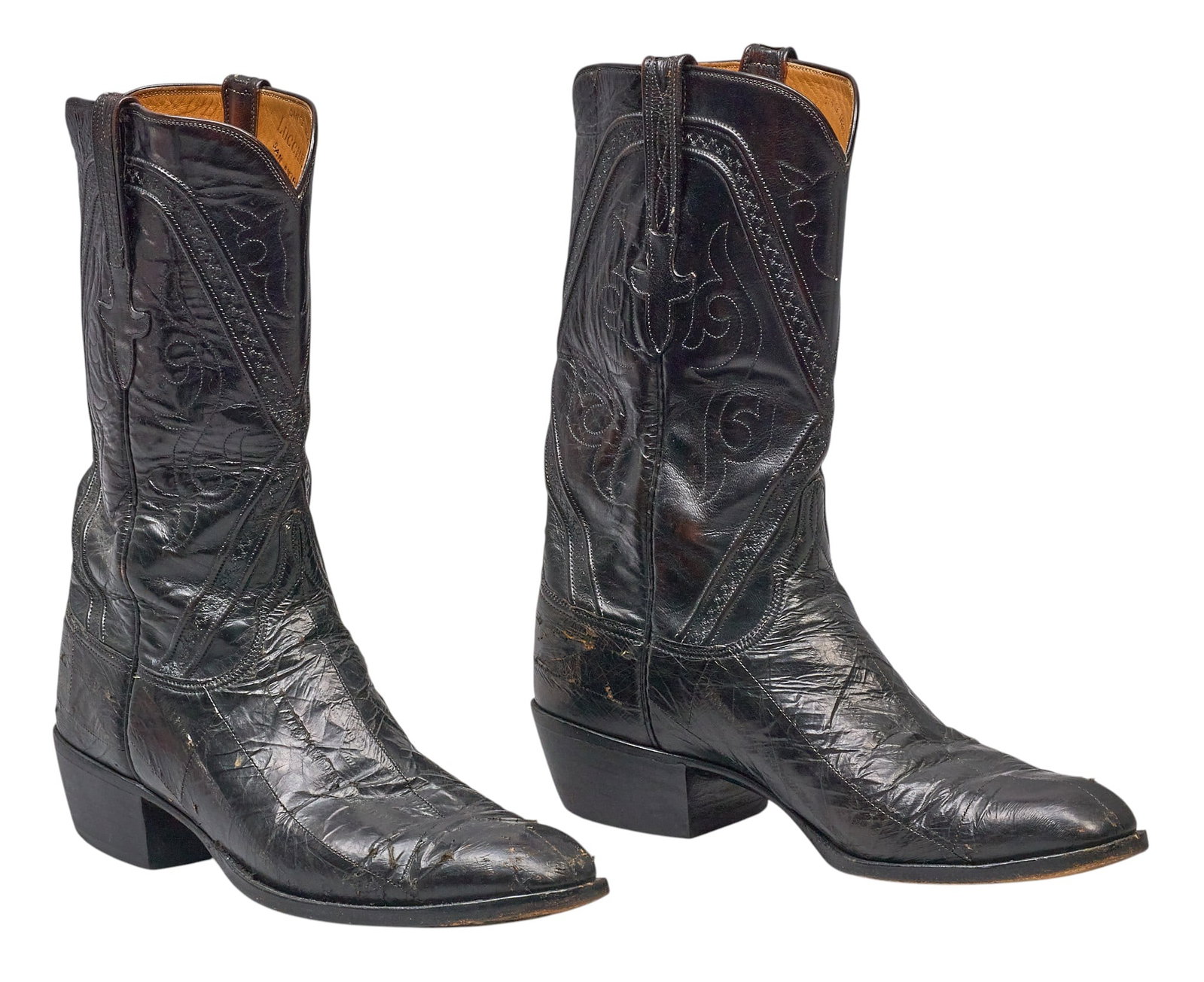 Red McCombs | Pair of Black Leather Lucchese Boots, 12B: Pair of Lucchese black leather cowboy boots, with stitched decoration, size 12B, branded "Lucchese, San Antonio, Texas" inside height 13.5 in. x width 4 in. x depth 12 in. / each Condit