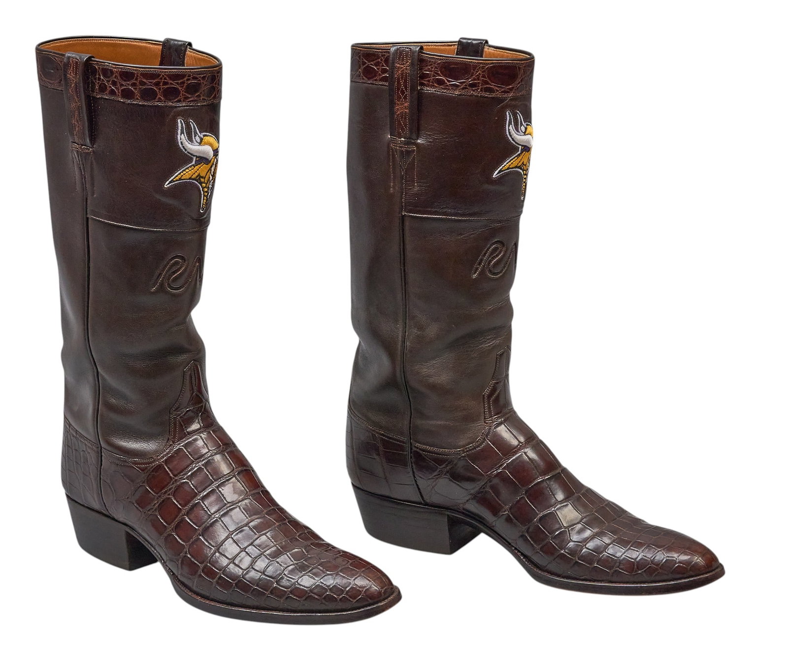 Red McCombs | Pair of Customized Alligator Belly Leather Boots: Pair of customized Little's Boot Company brown leather riding boots featuring McCombs Ranch monogram, and embroidered Minnesota Vikings emblem, and alligator belly leather vamps, 14 1/2 size 