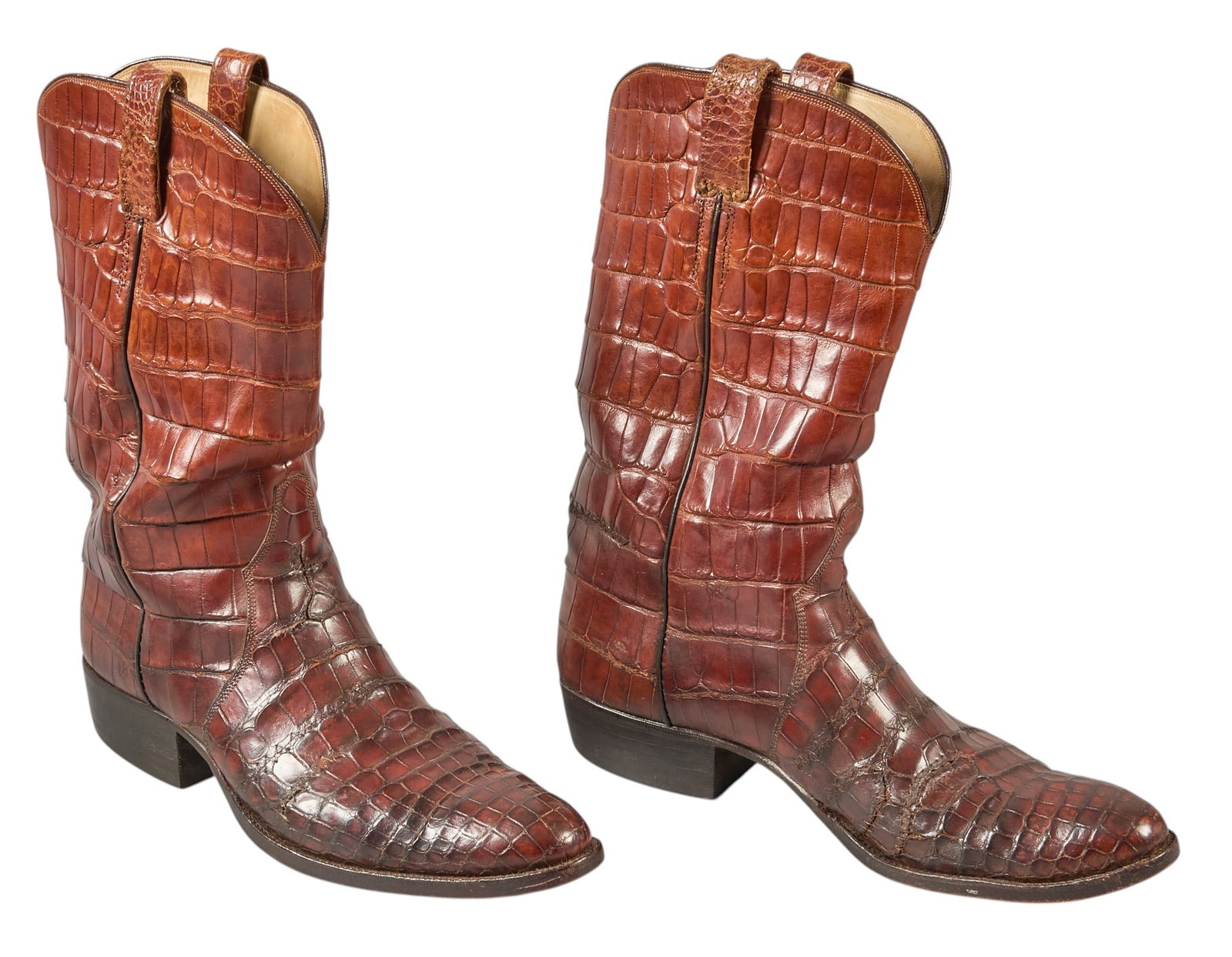 Red McCombs | Pair of Alligator Cowboy Boots: Pair of vintage alligator cowboy boots, size not marked, approximated as men's US size 12 / 13 height 13.5 in. x width 4.25 in. x depth 12 in. / each Condition B; good condition, 