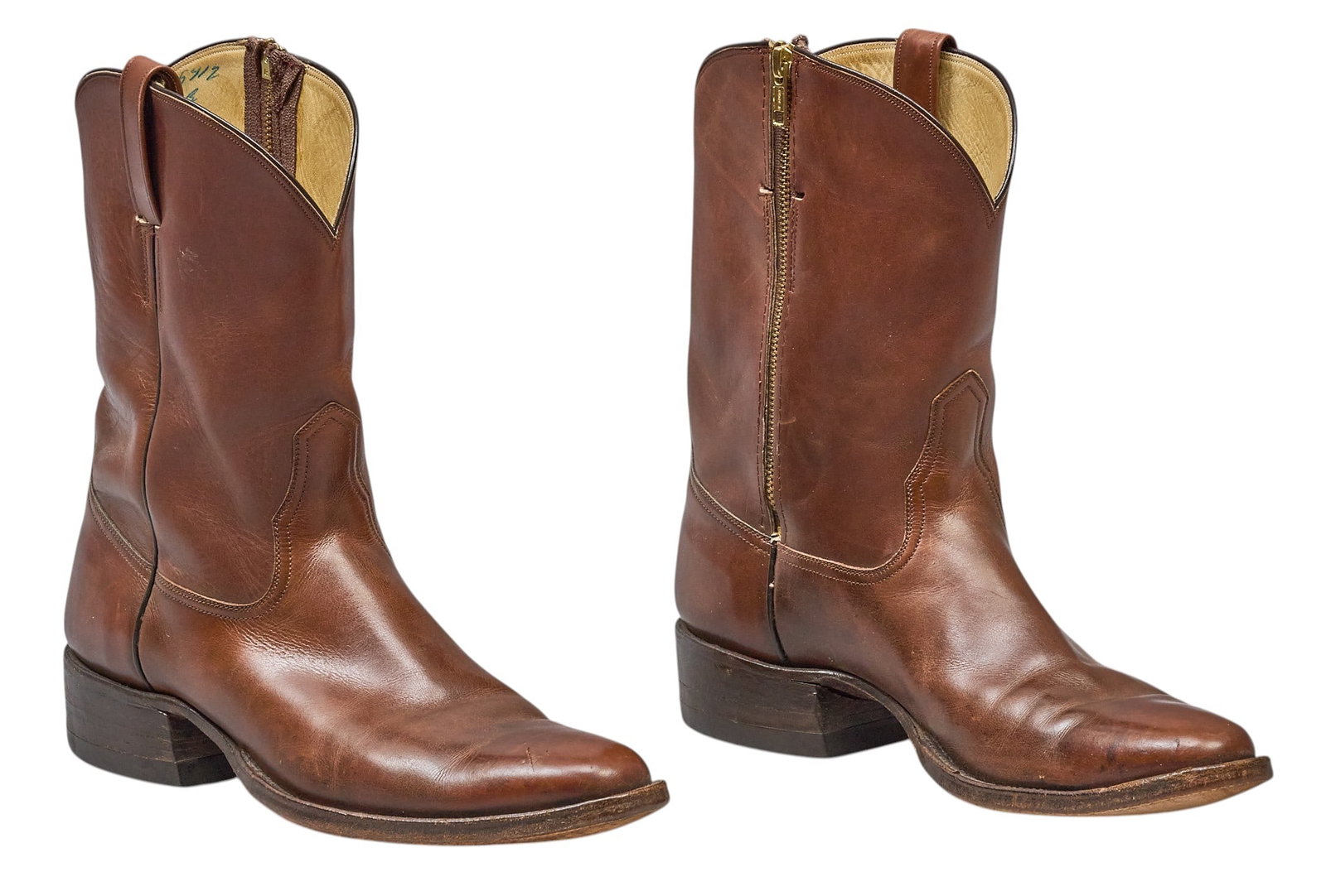 Red McCombs | Pair of Ryon's Brown Leather Boots: Pair of Ryon's (Forth Worth, Texas) brown leather boots with zipper closure, size not marked, approximated as US men's 12 height 11.25 in. x width 4 in. x depth 12 in. / each Condi