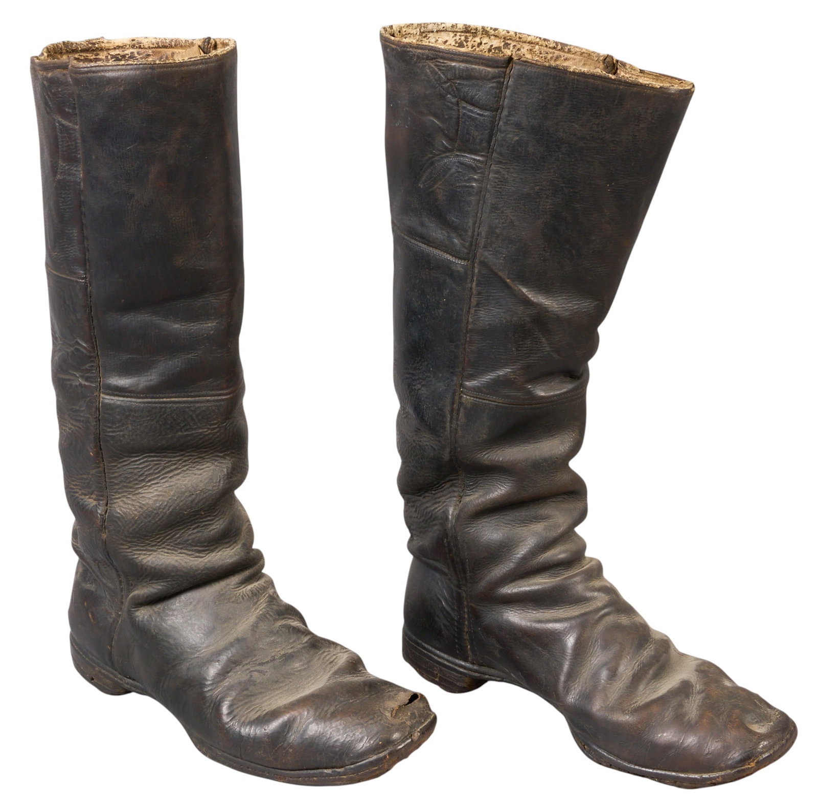 Red McCombs | Pair of Early Horseman's Boots: Pair of very early horseman's boots, pre-cowboy era, worn by soldiers and civilians, includes institution placard height 19 in. x width 5 in. x depth 8 in. / each Provenance: Property from th