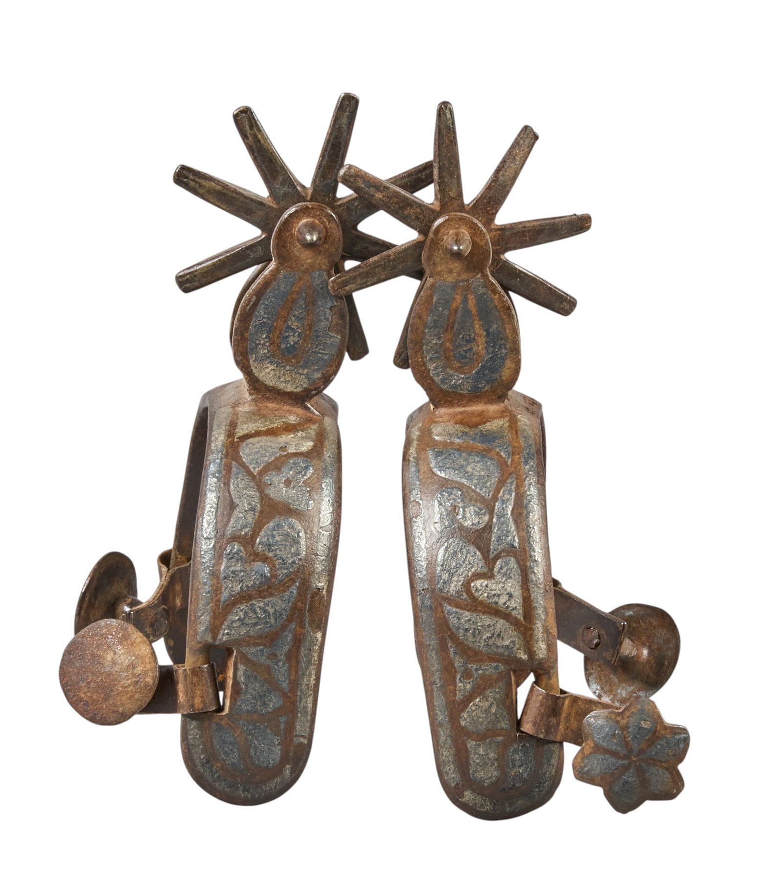 Red McCombs | Pair of Vintage Mexican Spurs: Pair of vintage Mexican spurs with distressed silver inlaid geometric design on heel band overall length: 5.5 in. heel width: 3.25 in. rowel diameter: 2.25 in. 