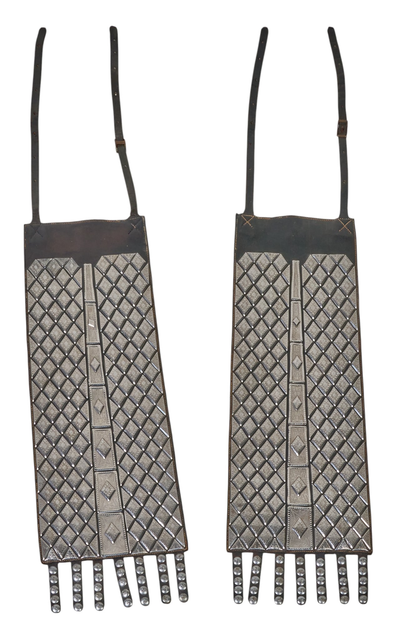 Red McCombs | (2) Silver Mounted Saddle Serapes: Pair of silver mounted black leather parade saddle serapes with diamond pattern length 58 in. x width 13 in. / each Prove