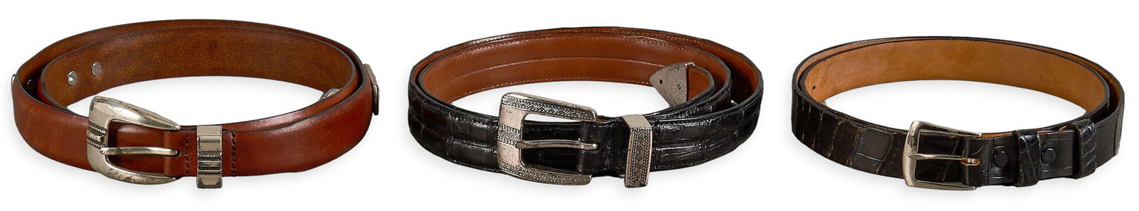 Red McCombs | (3) Leather Belts: Collection of three leather belts, includes one size 42 South American crocodile black leather belt, one size 44 Enmon Italian saddle leather belt, one size 38 Hirds of New Orleans genuine alliga