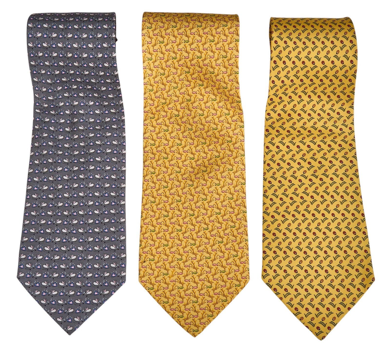 Red McCombs | (3) Salvatore Ferragamo Silk Ties: Collection of three Salvatore Ferragamo silk ties, includes yellow fish design, yellow ladybug design, purple mouse design 58 in. x 4 in. / each 