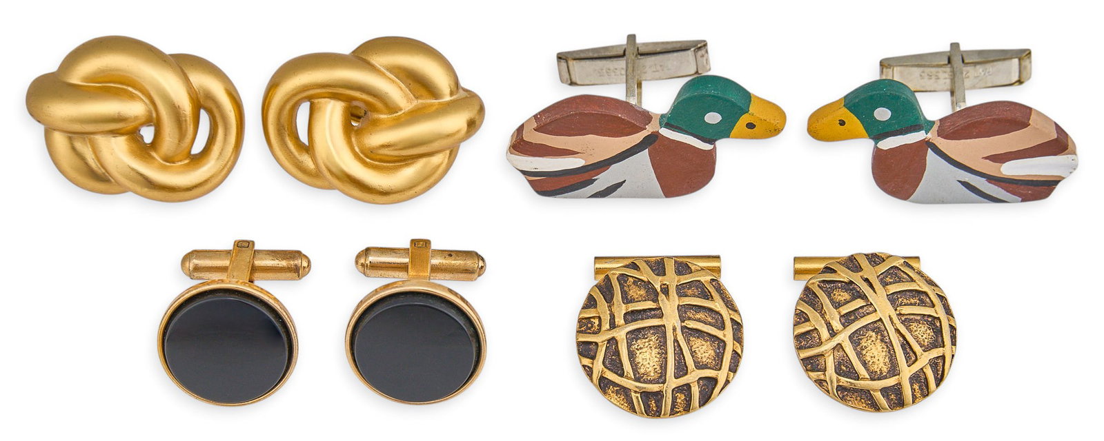 Red McCombs | Costume Cufflink Collection: Four pairs of men's costume cufflinks, various forms and designs, with toggle backs Provenance: Property from the personal estate collection of iconic Texas businessman, civic leader and