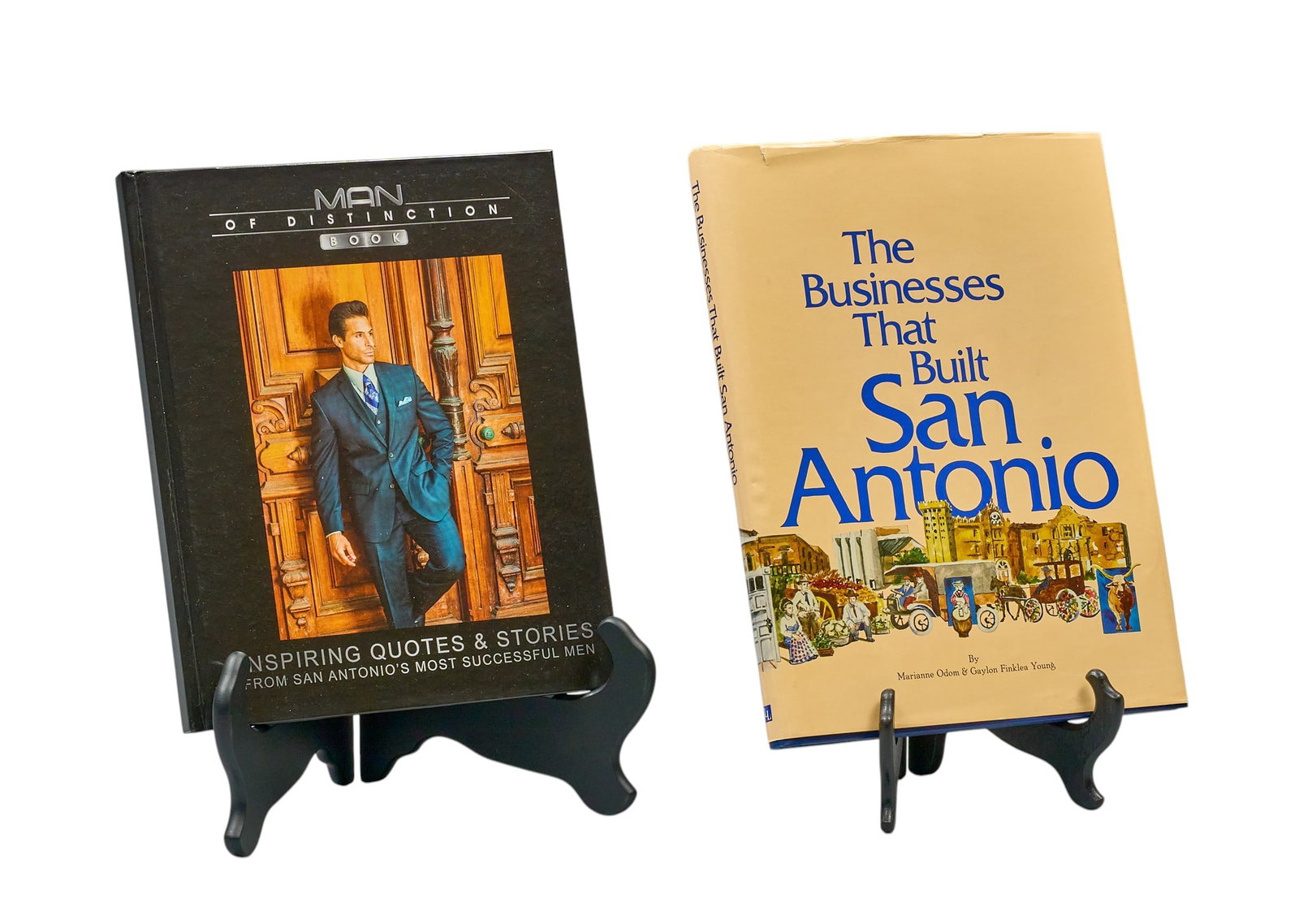 Red McCombs | (2) Business Books: Collection of two business books, includes signed copy of "The Businesses That Built San Antonio" by Marianne Odom and Gaylon Finklea Young, and copy of "Man of Distinction"