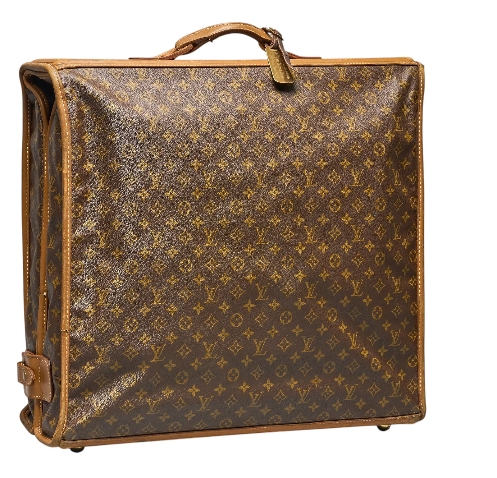 Red McCombs | Louis Vuitton Mongram Garment Bag: Louis Vuitton travel bag, with brown monogram canvas, and vachetta leather trim, includes "Mr. and Mrs. Red McCombs" tag height 21 in. x width 20 in. x depth 7 in. Cond