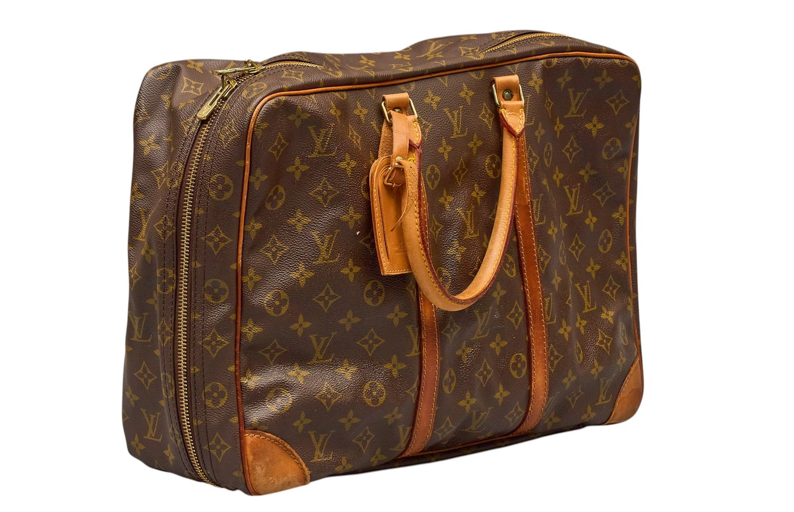 Red McCombs | Vintage Louis Vuitton Monogram Sirius 50: Louis Vuitton Sirius 50 bag in brown monogram canvas, with vachetta leather trim and handles, marked "Louis Vuitton Made in France" height 20 in. x width 19 in. x depth 5 in. Condition