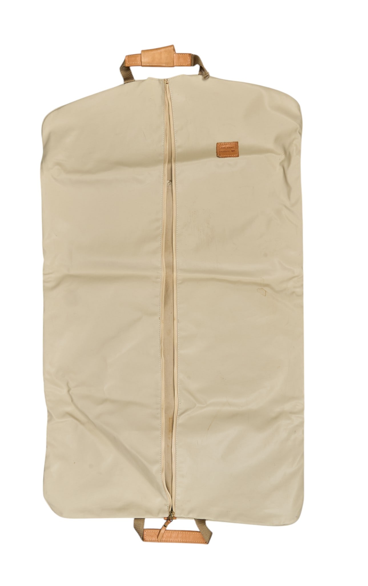 Red McCombs | Jon Hart Design Customized Garment Bag: Jon Hart Design customized garment bag, white canvas with leather handles, with McCombs Ranches brand on leather patch length 39 in. x width 23 in. Condition B; good condition, overal