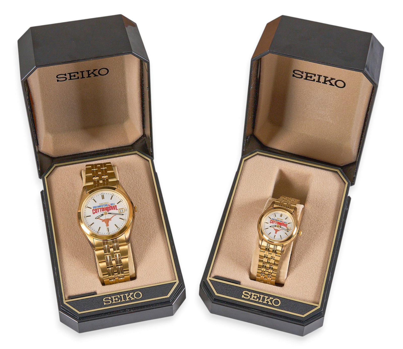 Red McCombs | (2) Seiko Cotton Bowl UT Watches with Cases: Two Seiko watches commemorating the Southwestern Bell Cotton Bowl Classic, each with University of Texas longhorn logo to watch face, gold-toned stainless steel bands, his and hers, with box