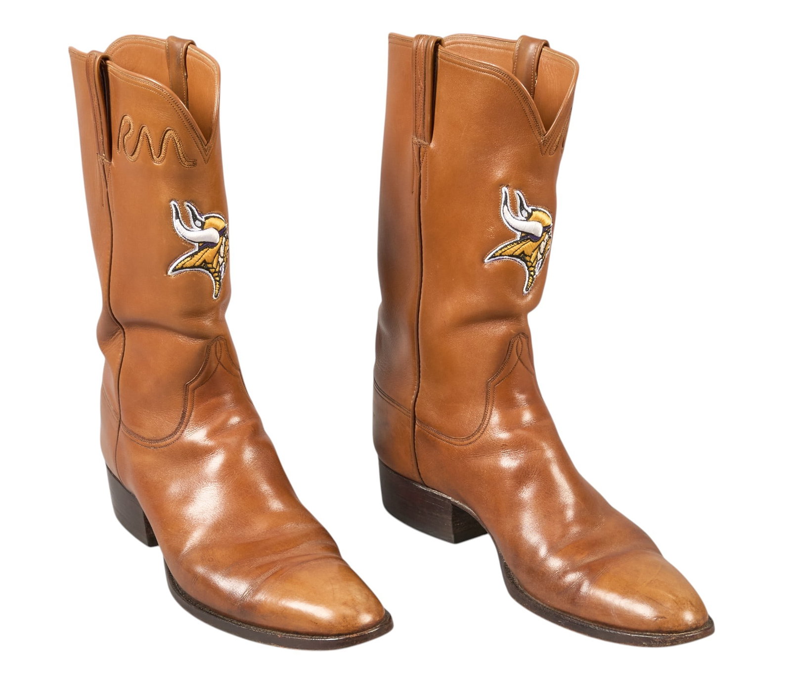 Red McCombs | Pair of McCombs Ranches x Minnesota Vikings Leather Boots: Pair of customized brown leather boots produced by Little Boot Company (San Antonio, Texas) featuring McCombs Ranches brand, and embroidered Minnesota Vikings football team logo; size not marked,