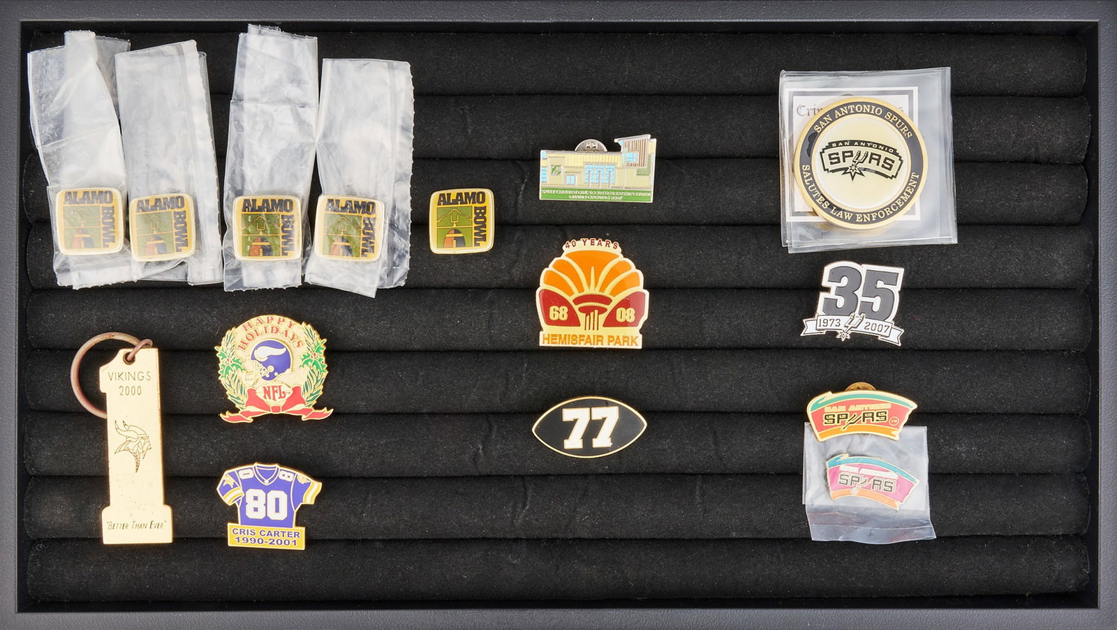 Red McCombs | Collection of Vintage Pins: Collection of vintage sports, event, and commemorative enamel lapel pins and keychain, including the Alamo Bowl, and the San Antonio Spurs, case not included Length 1 in. / largest Provenance: Propert