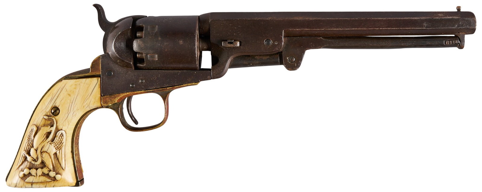 Red McCombs | Antique Colt 1851 Navy Revolver W/ Carved Bone Grips and Buffalo Hide Holster: Manufacturer: Samuel Colt (c. 1861) Model: 1851 Navy Caliber: 36 cal. Barrel Length: 7.5 in. OAL: 13.25 in. Condition: Fair-antique; bone grips have shrunk substantially & have yellow patina &