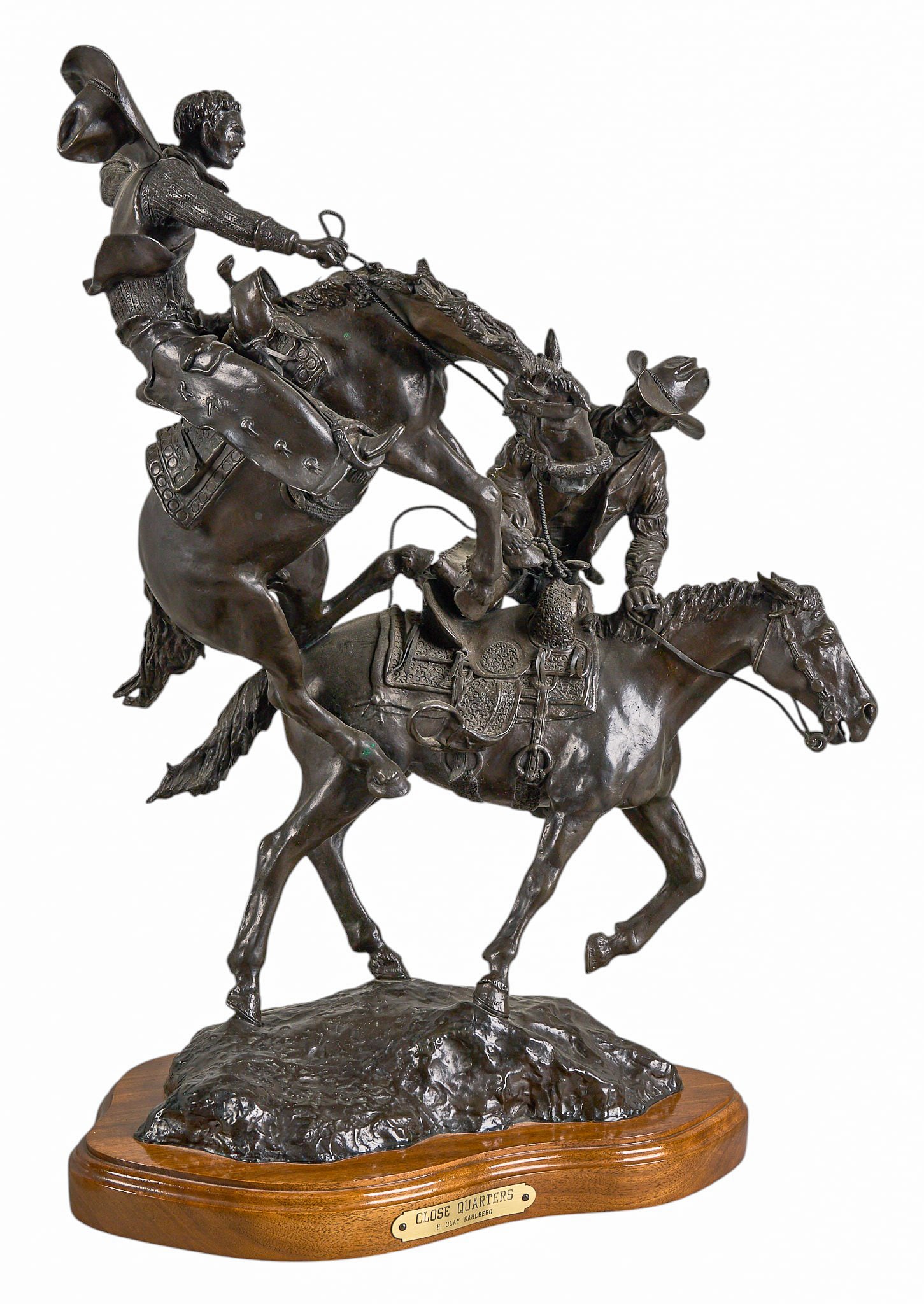Red McCombs | H. Clay Dahlberg, "Close Quarters": H. Clay Dahlberg (Texas, 1946-2021), "Close Quarters", artist-cast bronze sculpture on wooden base, with incised signature, edition number 11/15, and date, 1977 height 24 in. x width 15 in. 