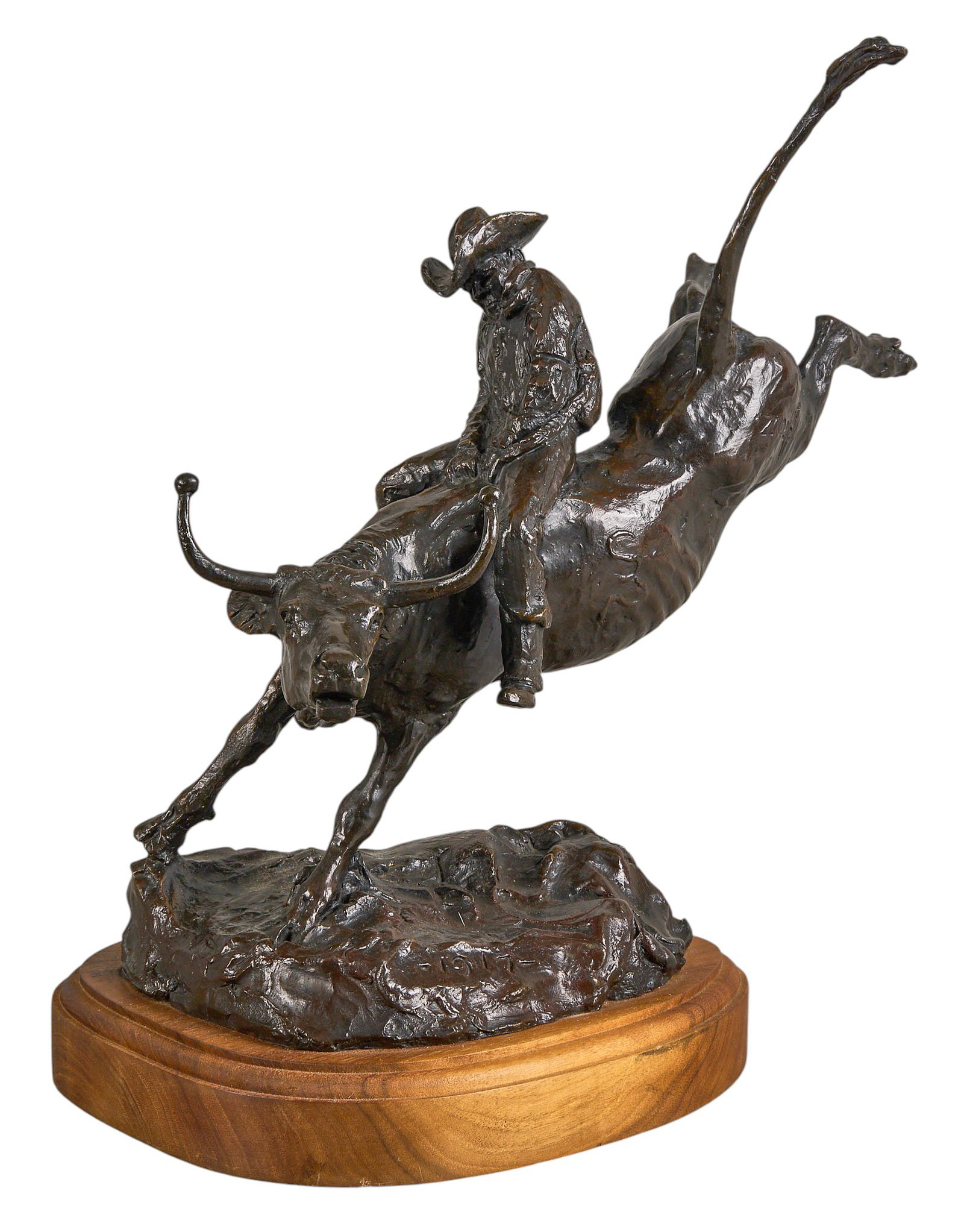 Red McCombs | Bob Scriver, "1917 - Steer Rider": Robert "Bob" Scriver (Blackfoot Reservation, Montana, 1914-1999), "1917 - Steer Rider", artist-cast bronze sculpture on wooden base, with incised signature, edition number 82/