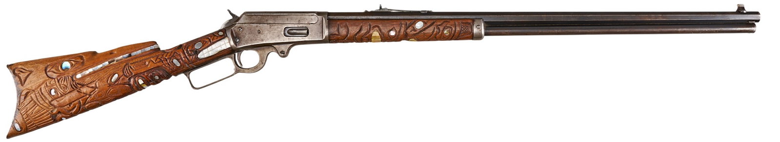 Red McCombs | Beautiful Folk Art Carved and Pearl Inlaid Marlin 1893 Lever Action Rifle: Serial: 448995 Manufacturer: Marlin Fire-Arms Co. (c. 1913) Model: 1893 Caliber: 30-30 Barrel Length: 26 in. OAL: 45 in. Condition: Good; wood stock & forend have light wear & handling marks; 