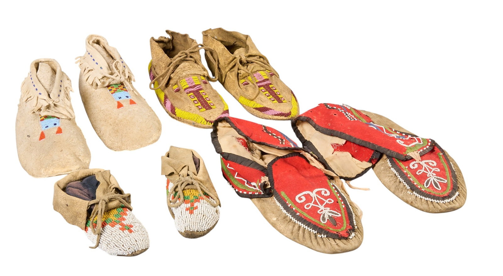 Red McCombs | (4) Pairs of Beaded Moccasins: Four pairs of Native American beaded moccasins, in various sizes and styles length 10 in. x width 4 in. / largest