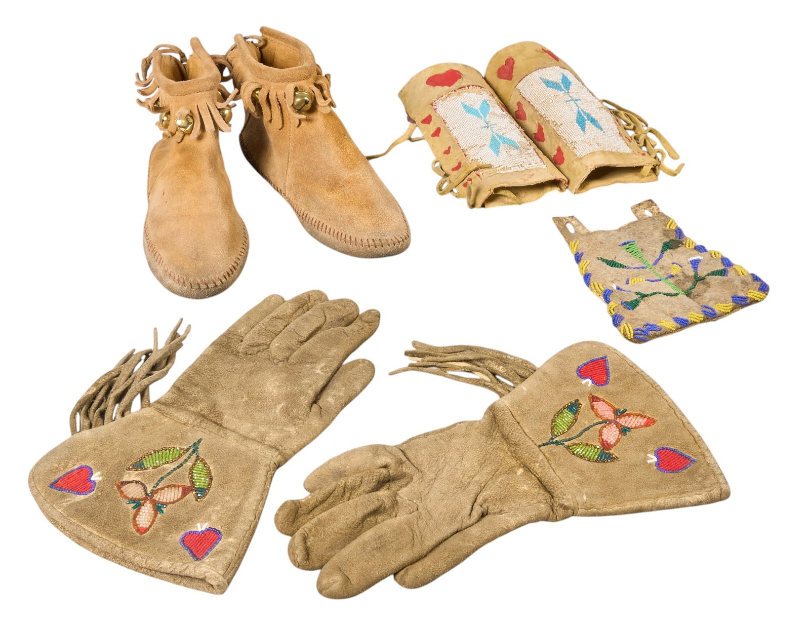 Red McCombs | Collection of (4) Native American Items: Collection of four Native American items, includes pair of early Apache arm guards circa late 19th century, pair of contemporary moccasins with bells circa 20th century, beaded lea