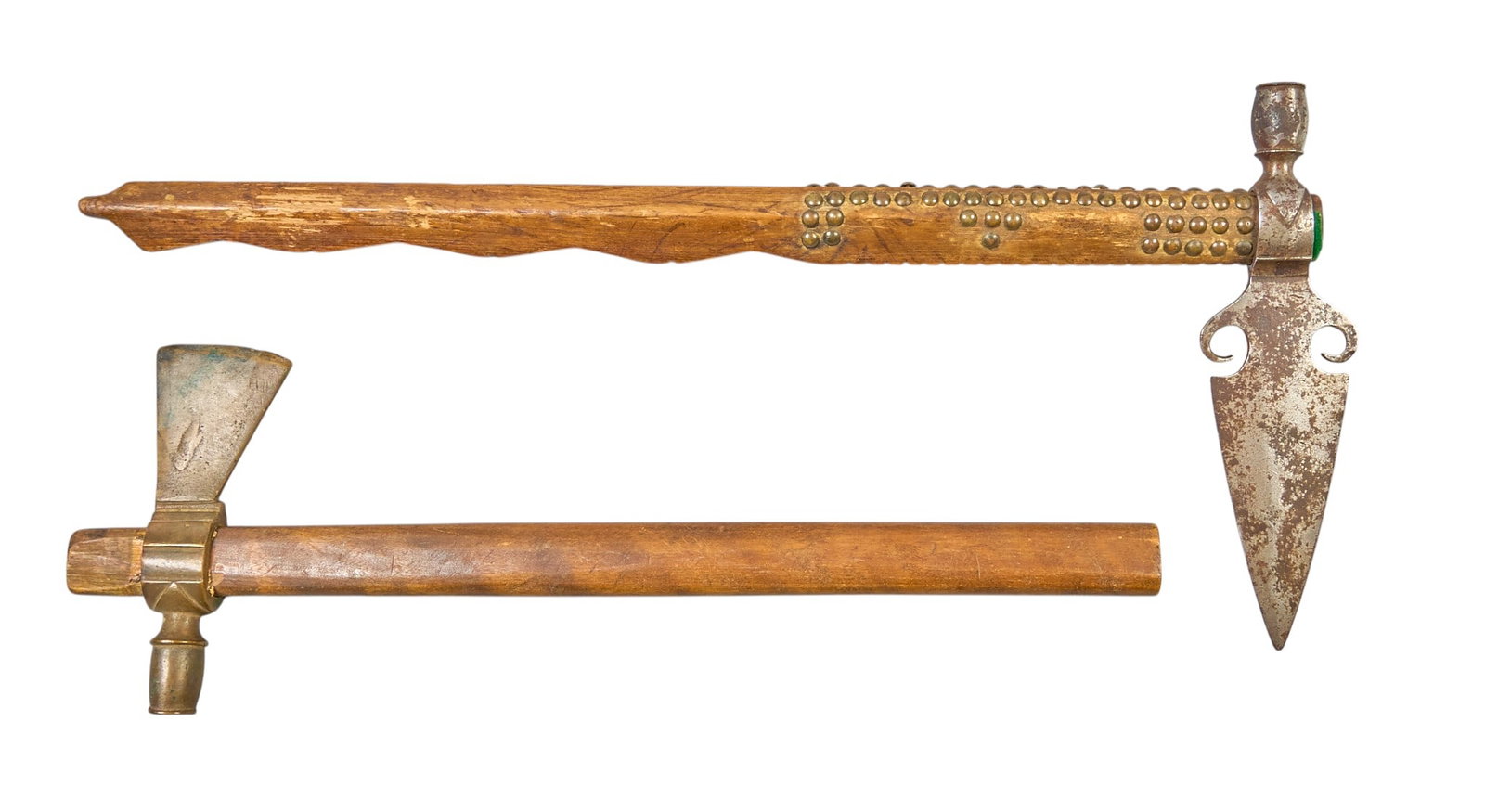 Red McCombs | (2) Native American Axe Pipes: Two Native American axe pipes, one featuring metal studs, circa 19th century length 26 in. x width 12 in. Provenance: Property from the personal estate collection of iconic Texas businessman, ci