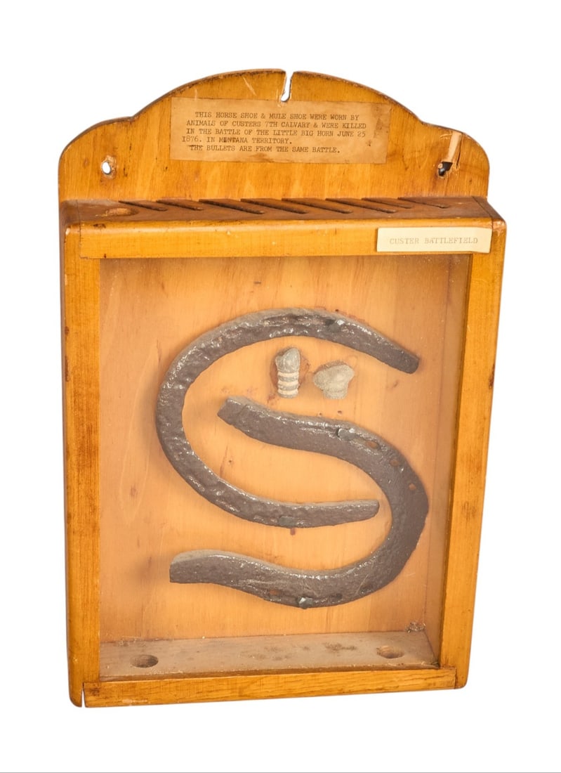 Red McCombs | Framed Battle of Little Bighorn Artifacts: Framed Battle of Little Bighorn (June 25, 1876), (also known as Custer's Last Stand), artifacts includes two bullets, one horseshoe, and one mule shoe recovered from battle sit