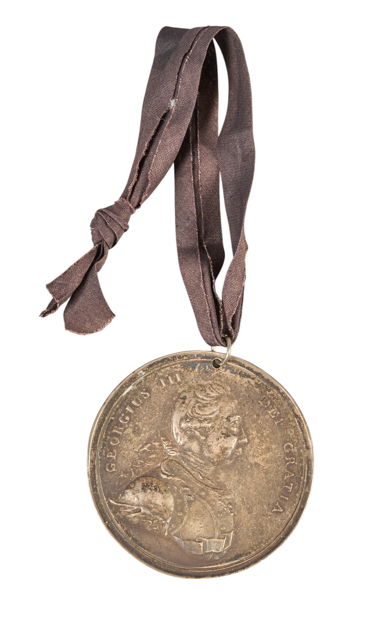Red McCombs | Antique Indian Medal: Antique Indian medal depicting portrait of George III, usually a token given to Indian allies during the period of the French and Indian Revolutionary Wars, circa 18th century, includes institution pl