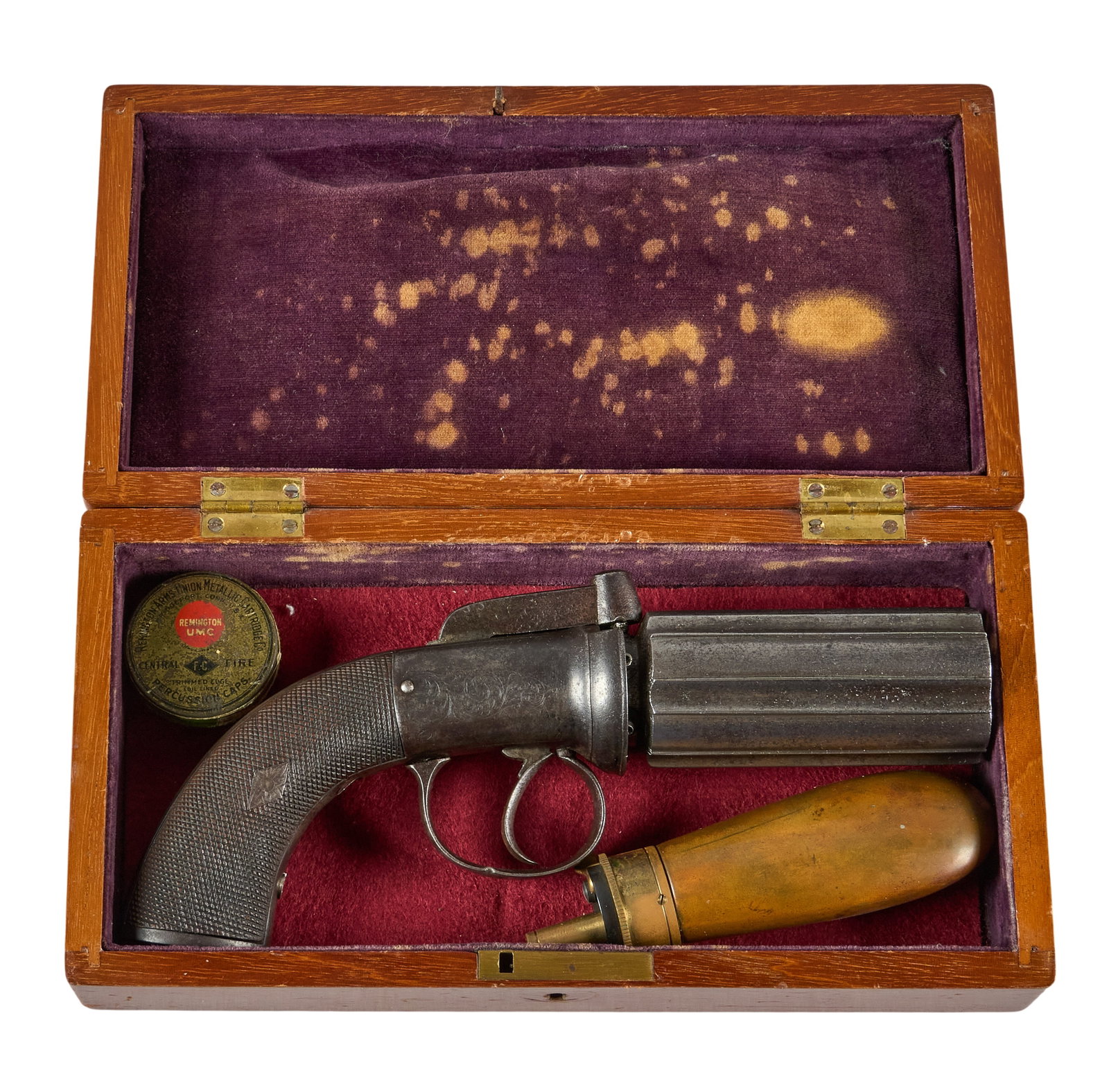 Red McCombs | Antique Cased English 6-Barrel Pepperbox Pistol W/ Accoutrements: Manufacturer: unknown English maker (c. mid-19th c.) Model: Pepperbox pistol Caliber: 38 cal. Barrel Length: 3.25 in. OAL: 8.5 in. Condition: Good-antique; checkered wood grips have moderate wear