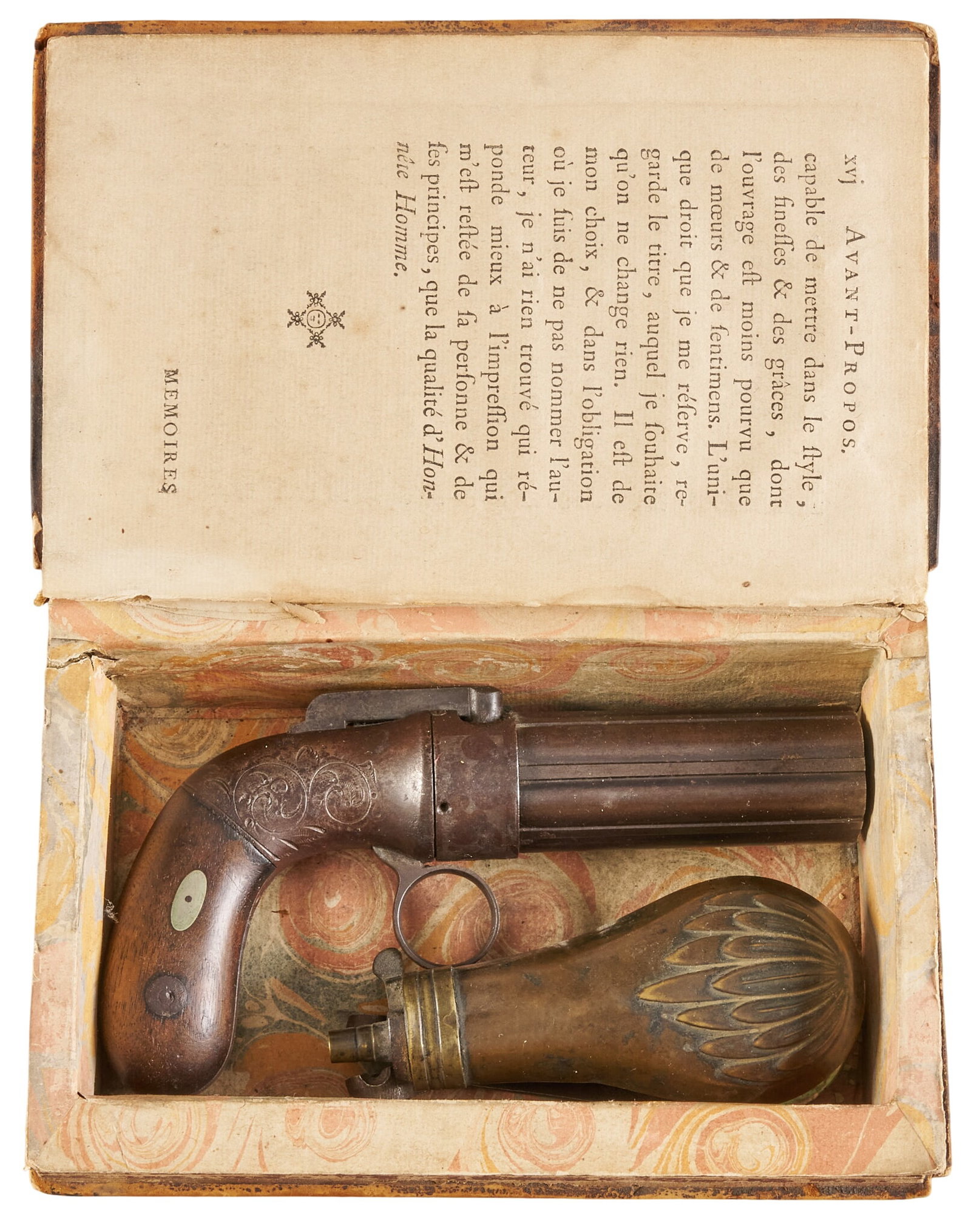Red McCombs | Allen & Thurber 6-Barrel Pepperbox Pistol in Book Case W/ Accoutrements: Manufacturer: Allen & Thurber Model: Allen's Patent 6 Barrel Pepperbox Caliber: 31 OAL: 7 in. Condition: Good-antique; moderate wear on grips; brown patina & scattered pitting throughout;