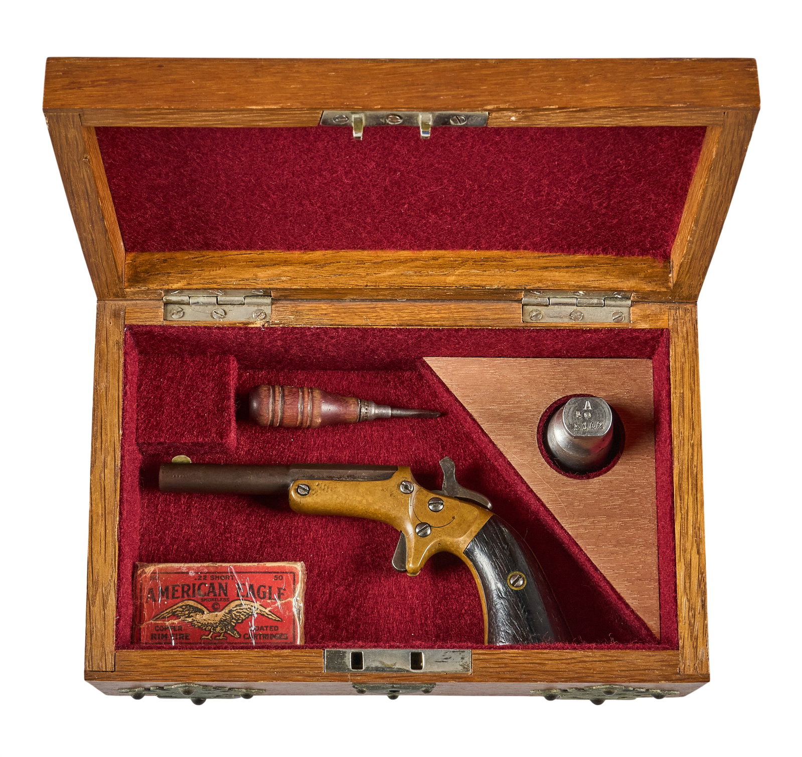 Red McCombs | Cased Antique J. Steven's 22 Short Old Model Pocket Pistol: Serial: 22220 Manufacturer: J. Stevens & Co. (c. 1870s-1880s) Model: Old Model pocket pistol Caliber: 22 Short Barrel Length: 3.5 in. OAL: 6.25 in. Condition: Good-antique; wood gips have moderate