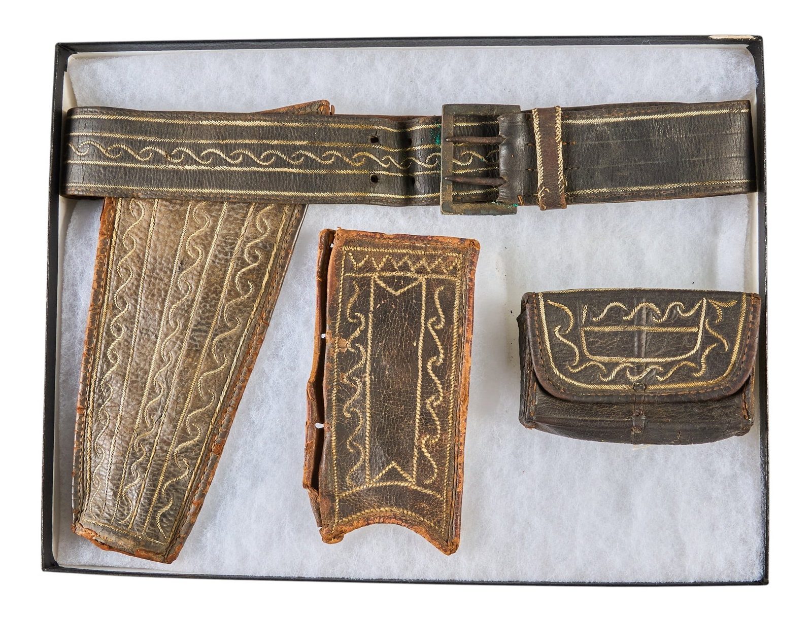 Red McCombs | Framed Mexican Gun Belt: Framed Mexican gun belt, with embroidered geometric design, circa mid-late 18th century height 3.5 in. x width 12 in. x depth 16 in. Provenance: Property from the personal estate colle