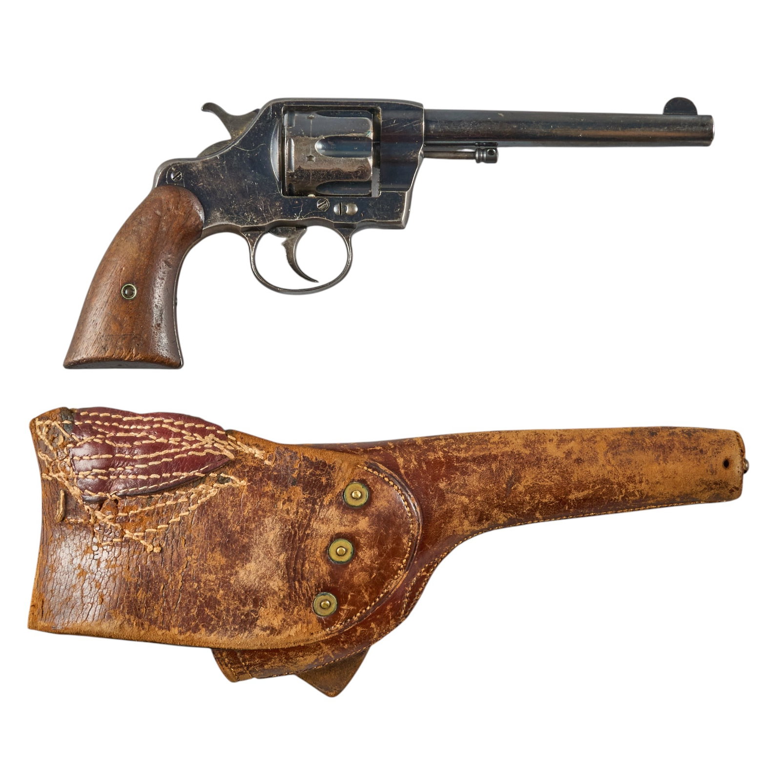Red McCombs | Spanish American War Colt M1894 38 DA Revolver W/ Holster: Serial: 1162 Manufacturer: Colt's PT. F.A. Mfg. Co. (c. 1892) Model: US Army Model 1894 Caliber: 38 Special Barrel Length: 6 in. OAL: 11 in. Condition: Good-Antique; grips have pressure dents &