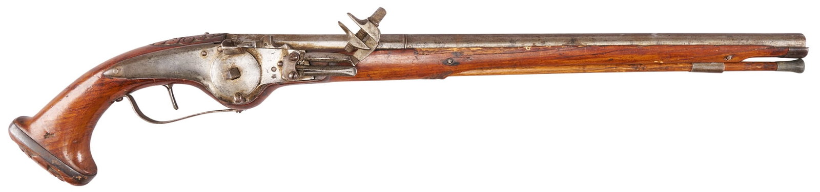 Red McCombs | 17th C. Carved Germanic Wheelock Pistol: Manufacturer: unknown Germanic (c. 17th c.) Model: wheellock pistol Caliber: 54 cal. Barrel Length: 17.5 in. OAL: 25 in. Condition: Good-antique; wood stock has has fair amount of wear w/ chipping, sp