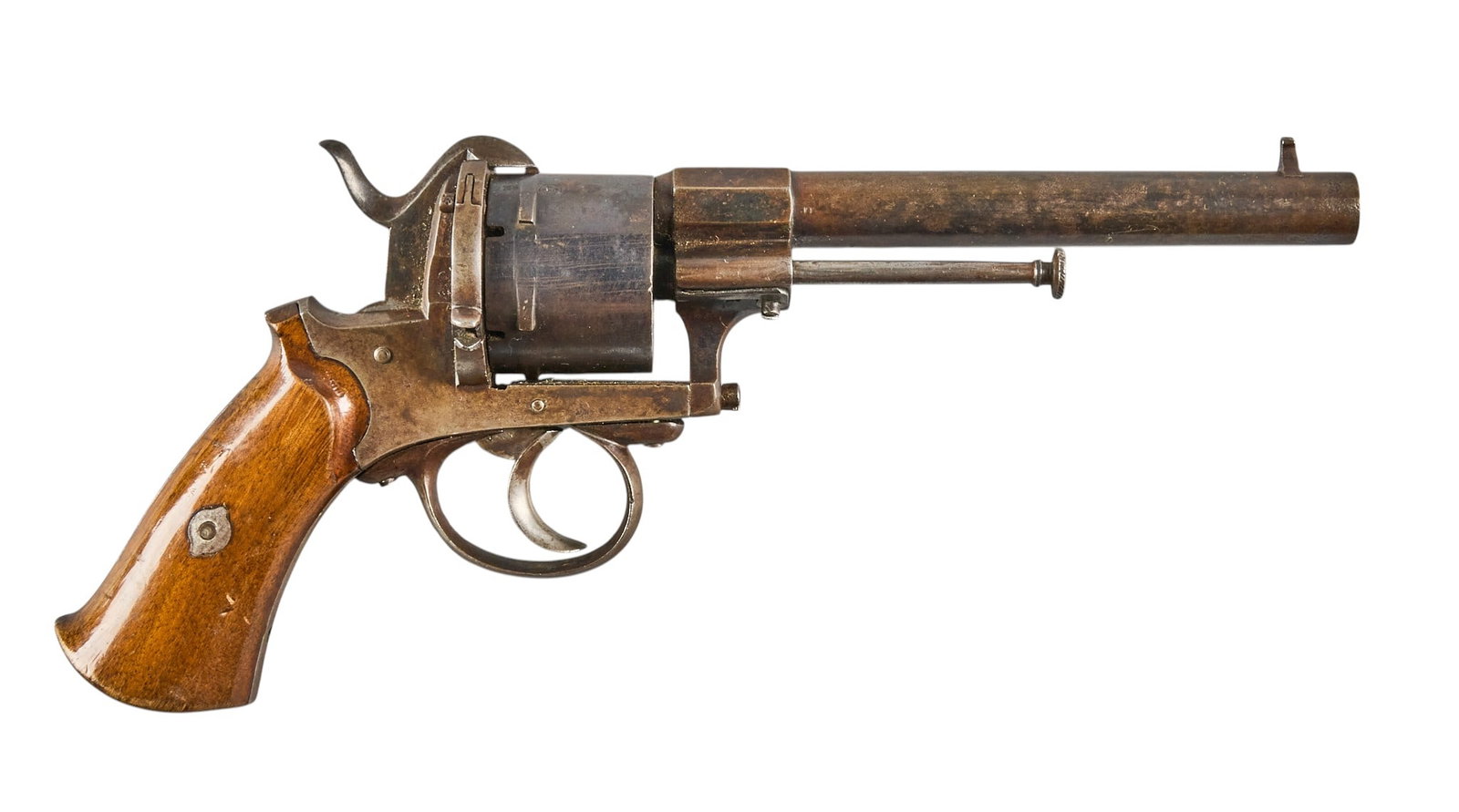Red McCombs | Belgian Pinfire Revolver: Model: Pinfire Revolver Caliber: 43 OAL: 11 in. Condition: Good-antique; moderate wear throughout; brown patina showing through blue finish; light pitting; mechanically functional; missing lanyard rin