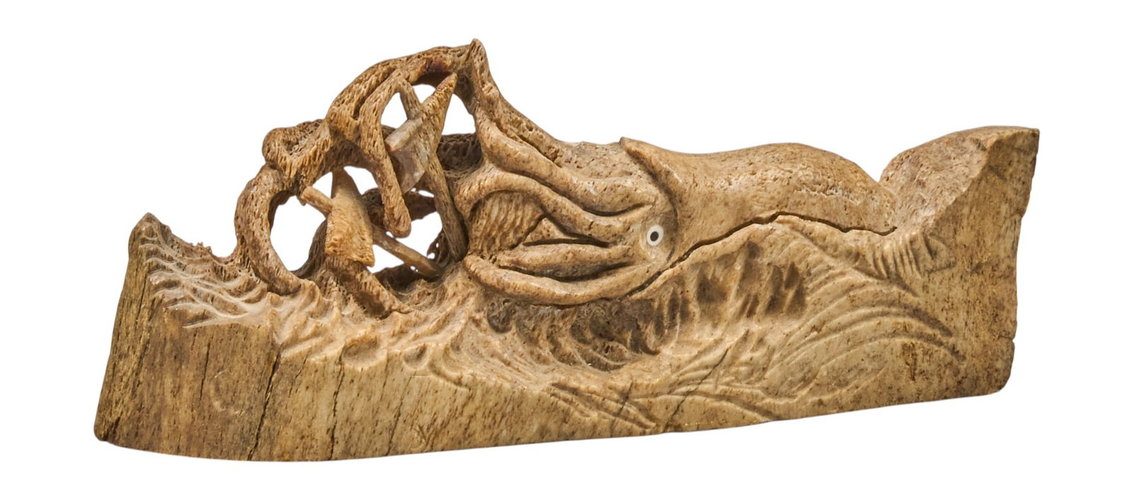 Red McCombs | Scrimshaw Squid: Scrimshaw folk art piece depicting squid height 3.5 in. x width 9 in. x depth 2 in. Provenance: Property from the personal estate co