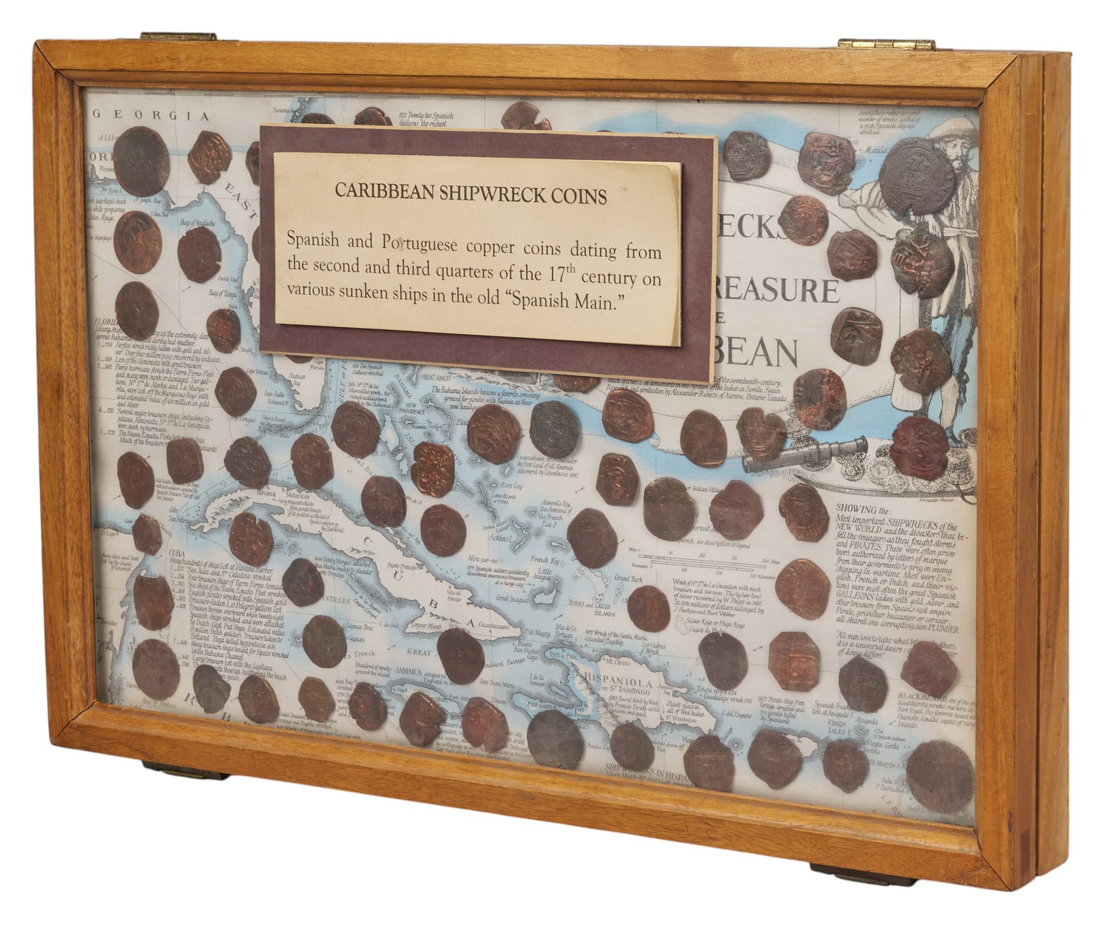 Red McCombs | Caribbean Shipwreck Coins: Framed collection of Spanish and Portuguese copper coins dating form the second and third quarters of the 17th century on various sunken ships in the old "Spanish Main", includes