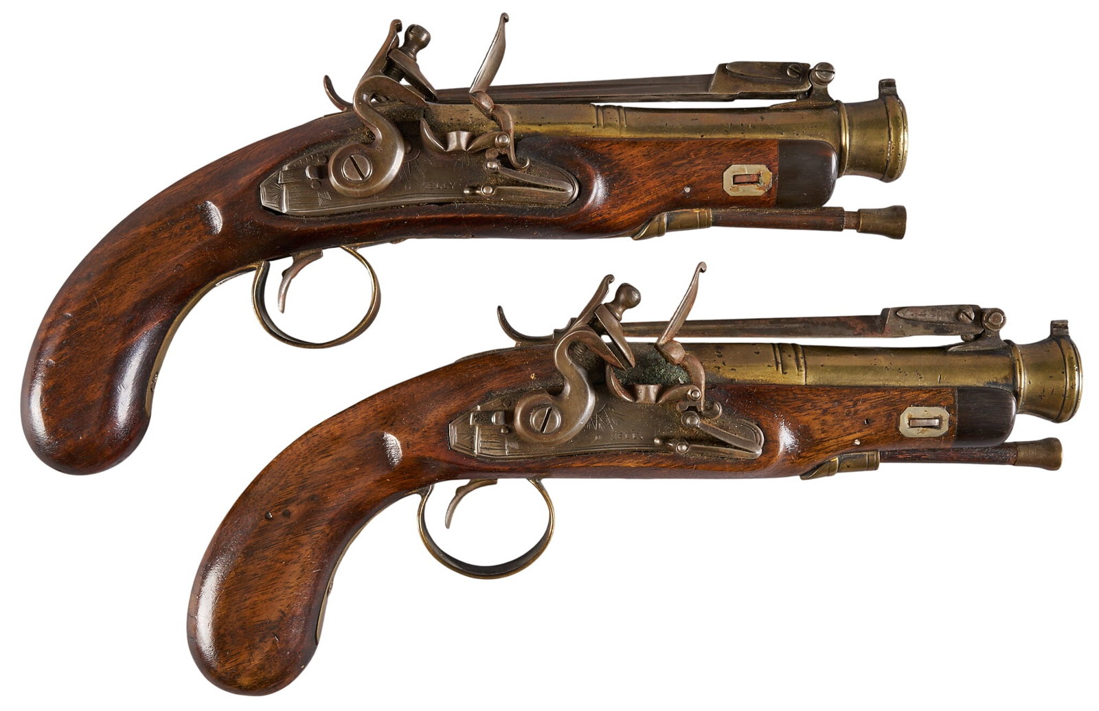Red McCombs | Pair of D. Kelly Flintlock Blunderbuss Pistols W/ Bayonets: Manufacturer: D. Kelley Model: Flintlock Blunderbuss W/ Bayonet Caliber: Approx. 50 Barrel Length: 6 in. OAL: 11.25 in. Condition: Good; pressure dents & scratches throughout; oxidation with some 