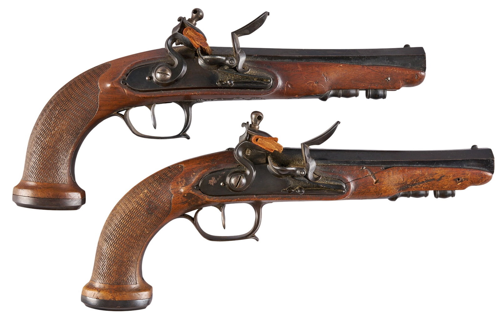 Red McCombs | Pair of Black French Flintlock Dueling Pistols: Manufacturer: France / Belgium Model: Flintlock Dueling Pistol Caliber: 70 OAL: 12.5 in. Condition: Good-antique; possibly refinished; moderate wear; light rust; mechanically functional Marked: crown 