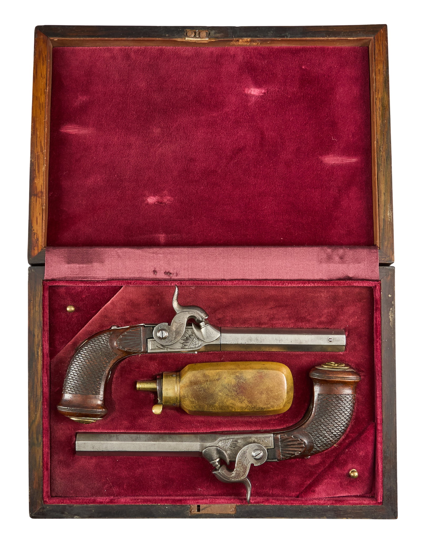 Red McCombs | Cased Pair of Sharpe London Percussion Dueling Pistols: Manufacturer: Belgium / Sharpe-London Model: Dueling Pistol Caliber: 40 OAL: 8.5 in. Condition: Good-antique; moderately worn grips; gray patina with scattered light pitting; mechanically functional I