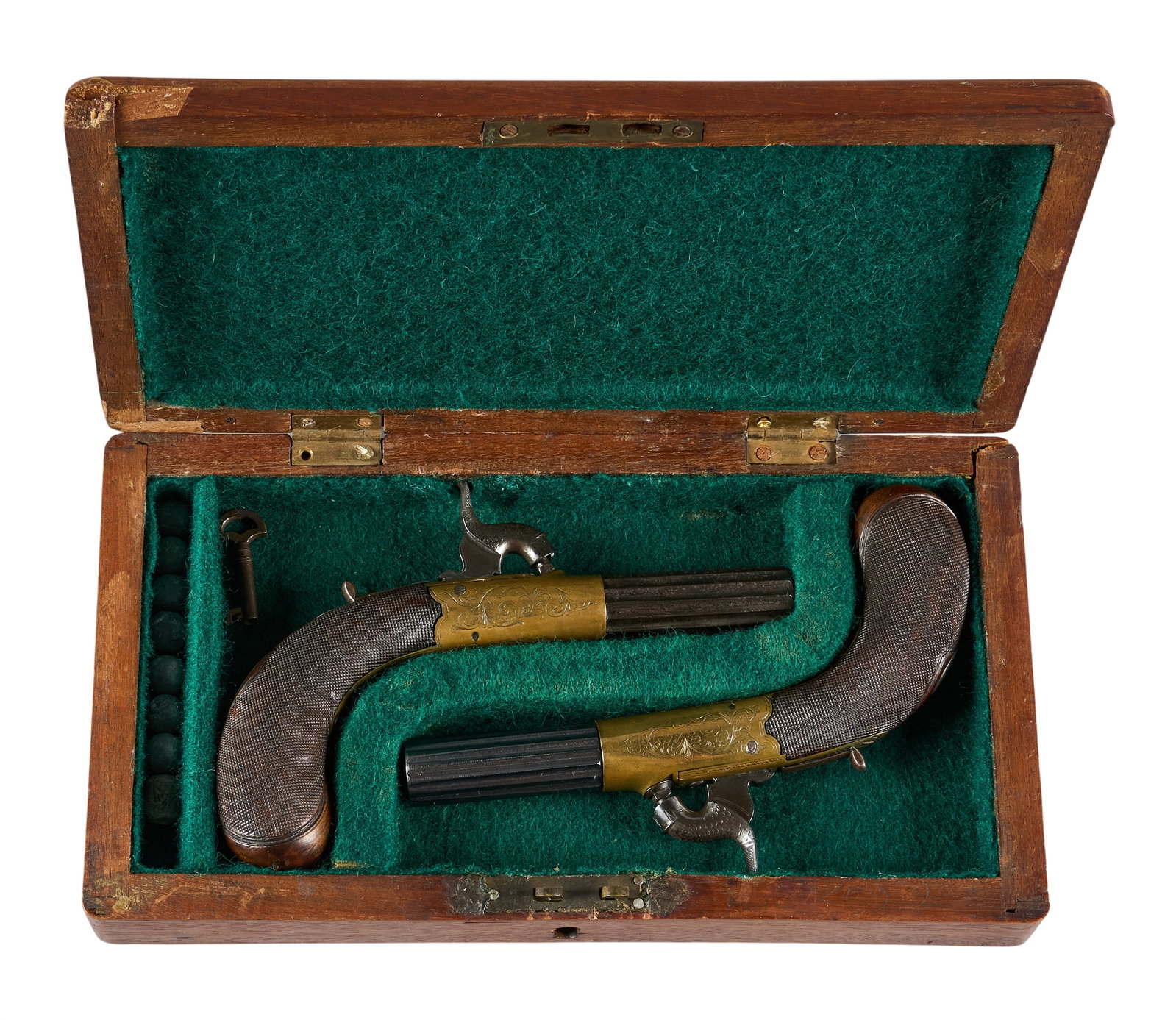 Red McCombs | Cased British J. Harrison of Driffield Dueling Pistols: Manufacturer: J. Harrison-Driffield, England (c. mid-19th c.) Model: duelling pistols Caliber: 45 cal. Barrel Length: 2.25 in. OAL: 6.5 in. Condition: Very good-antique; wood handles have very light w