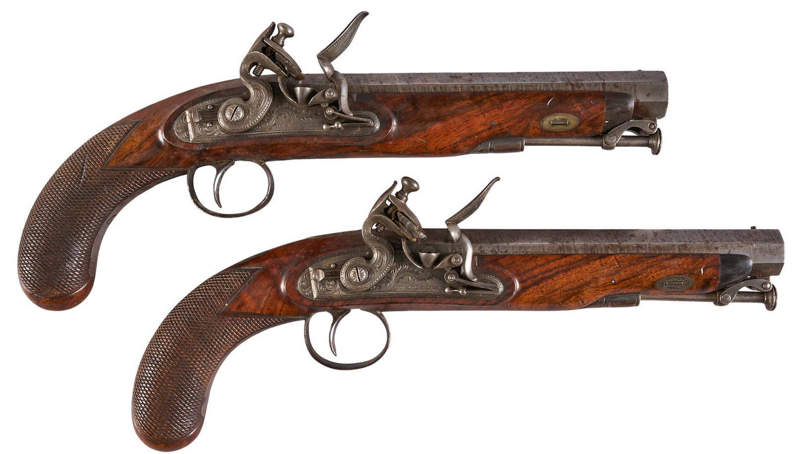 Red McCombs | Pair of English Flintlock Pistols in Mexican Leather Holsters: Manufacturer: H.W. MORTIMER-London Model: Flintlock Pistol Caliber: 65 OAL: 12.5 in. Condition: Very good-antique; light scatter pitting; light wear for age; mechanically functional Includes: scroll e