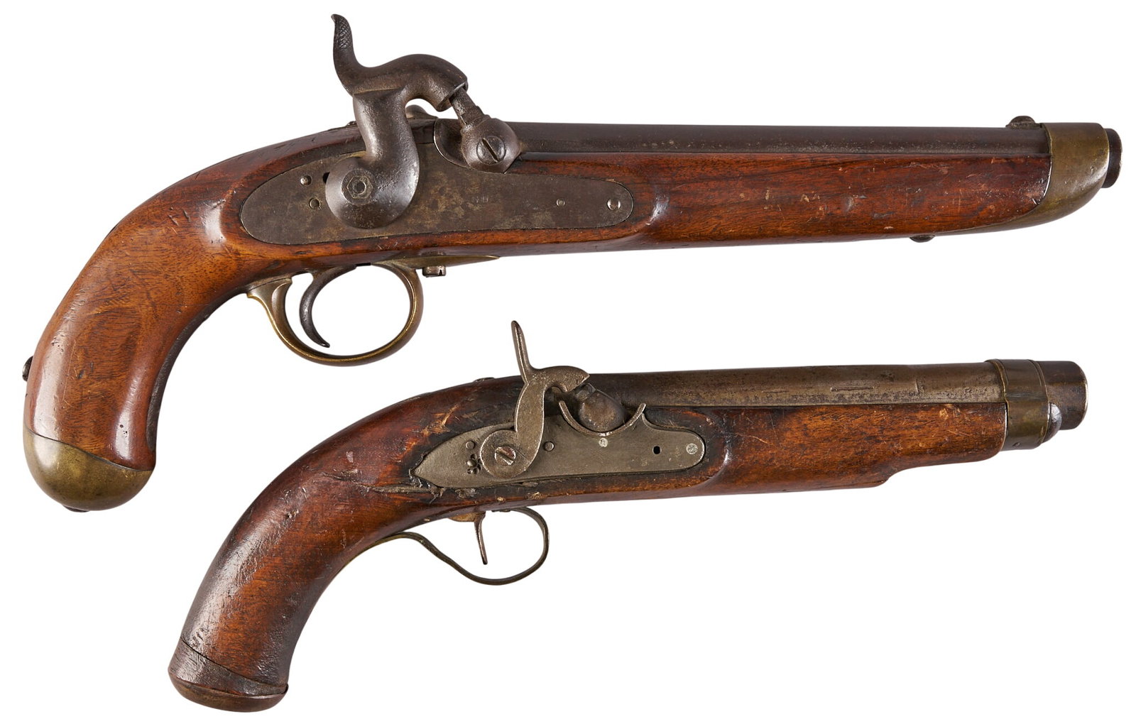 Red McCombs | Pair of Percussion Cavalry Pistols: Manufacturer: (1) SUHL ; (2) Unknown Model: Percussion Pistol Caliber: (1) Approx. 54; (2) Approx. 64 Barrel Length: (1) 9.5 in.; (2) 7.5 in. OAL: (1) 15.5 in.; (2) 12.75 in. Condition: Good-antique; 
