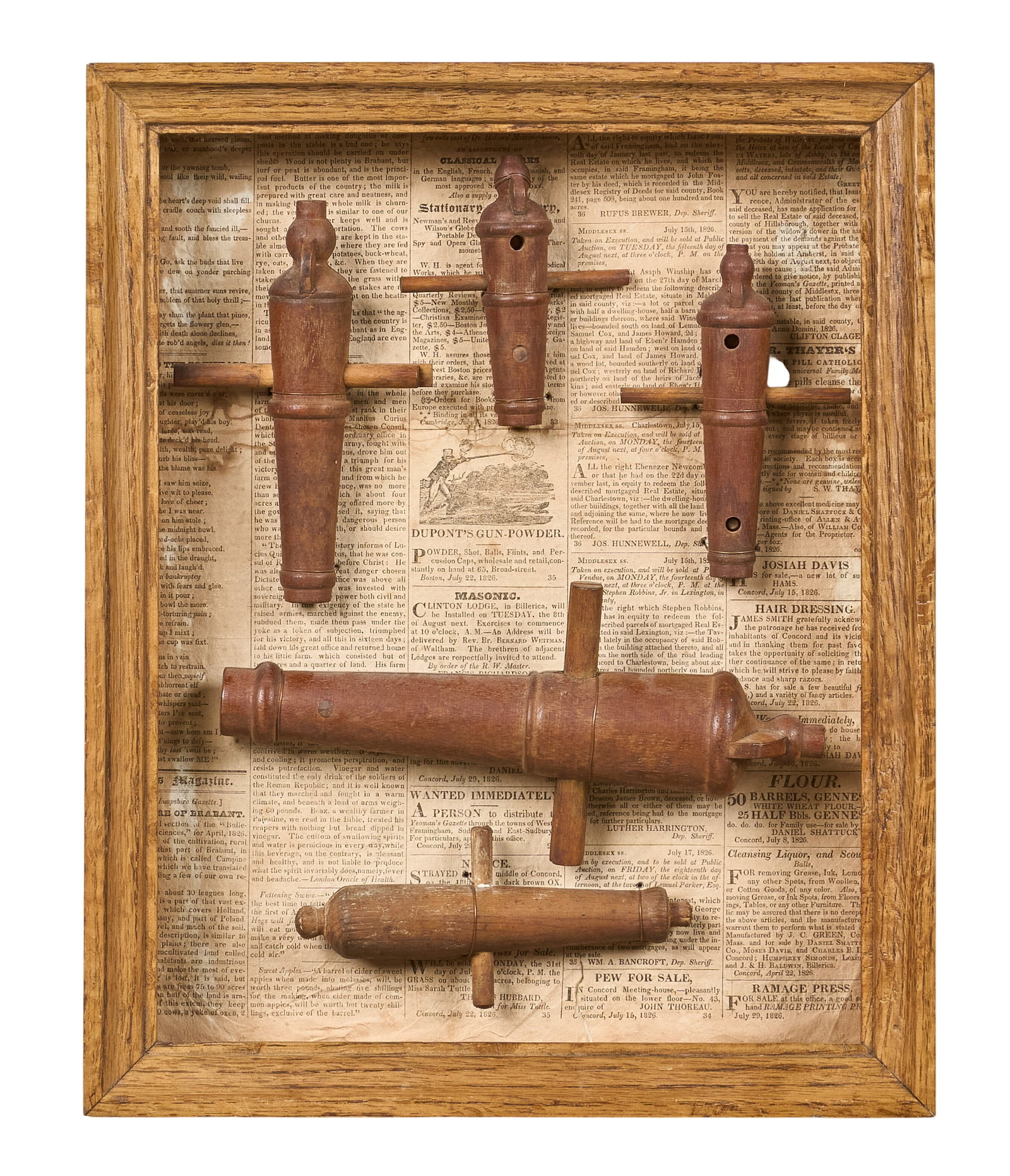 Red McCombs | Framed Miniature Cannons: Framed collection of five miniature wooden cannons height 16 in. x width 13 in. x depth 2.5 in. Provenance: Property from the personal estate collection of iconic Texas businessman, civic leader