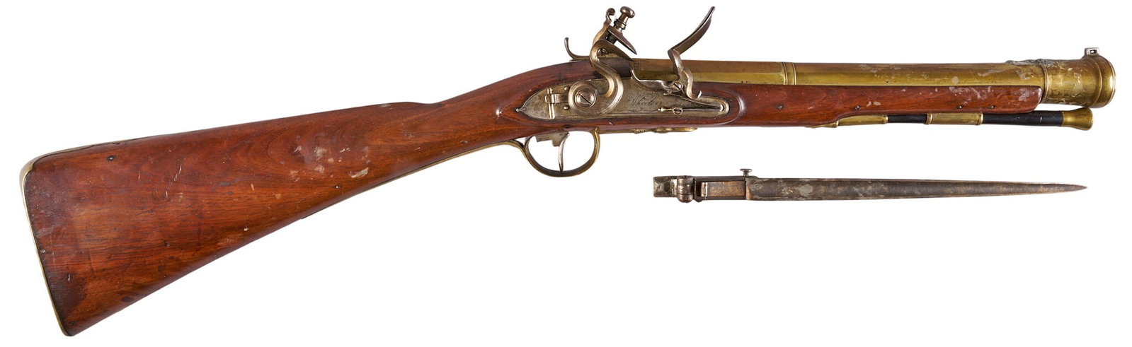 Red McCombs | Wheelen London Blunderbuss Flintlock W/ Bayonet: Manufacturer: Wheelen-London (c. 18th c.) Model: Blunderbuss flintlock carbine Caliber: approx. 60 cal. Barrel Length: 11.5 in. OAL: 27.5 in. Condition: Good-antique; wood stock has light wear & d