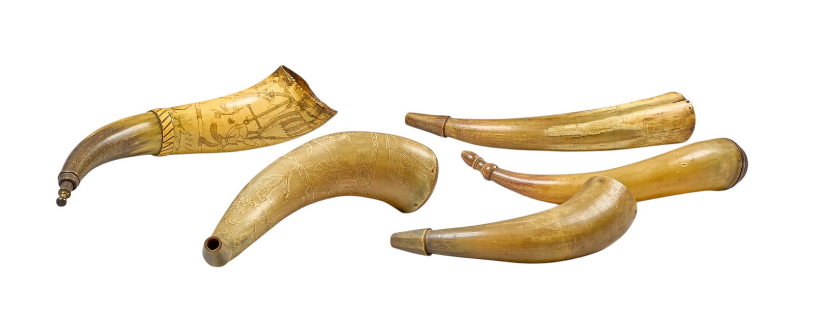 Red McCombs | (5) Antique Powder Horns W/ Scrimshaw: Collection of five antique powder horns, some featuring scrimshaw decoration height 5 in. x width 16 in. x depth 5 in. / largest Provenance: Property from the personal estate collection of iconic Texa