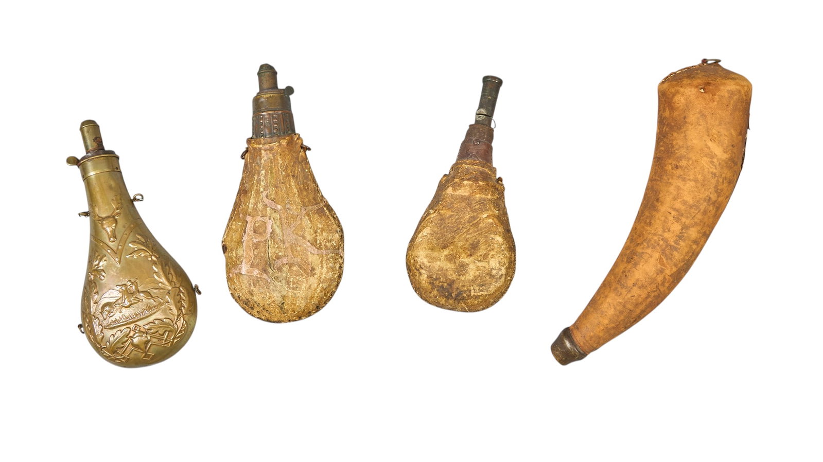 Red McCombs | Collection of (3) Powder Flasks and Shot Pouch: Collection of three powder flasks and one shot pouch, includes two powder horn examples with rawhide repairs, dated 1840's, from Pacific Northwest height 12 in. x width 7 in. x dep