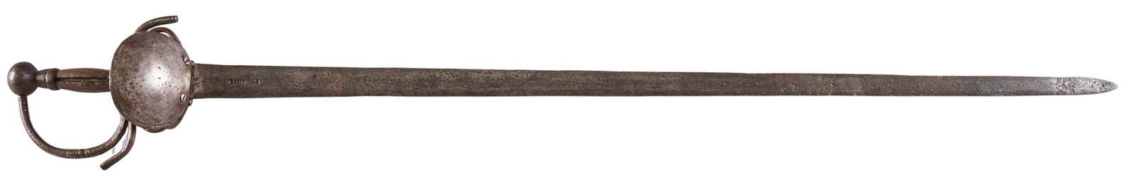 Red McCombs | 18th Century Spanish Colonial Sword: 18th century Spanish Bilbo broad sword; possibly Toledo made OAL: 42 in. condition commensurate with age; dark patina Provenance: Property from the personal estate collection of iconic Texas businessm